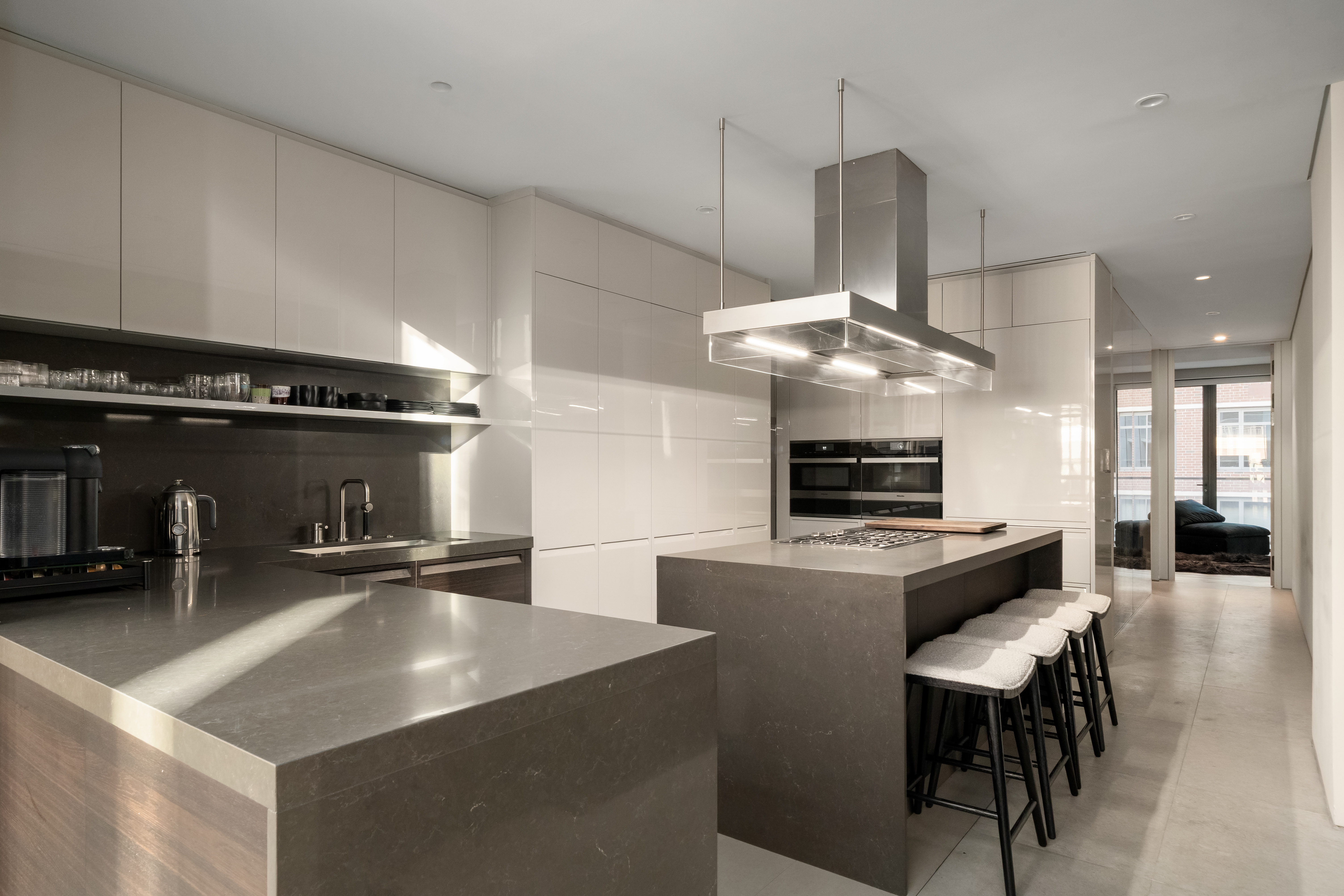 522 West 29th Street, Unit 7D Manhattan, NY 10001 - Photo 4 of 17 a kitchen with stainless steel appliances granite countertop a sink a stove and a refrigerator