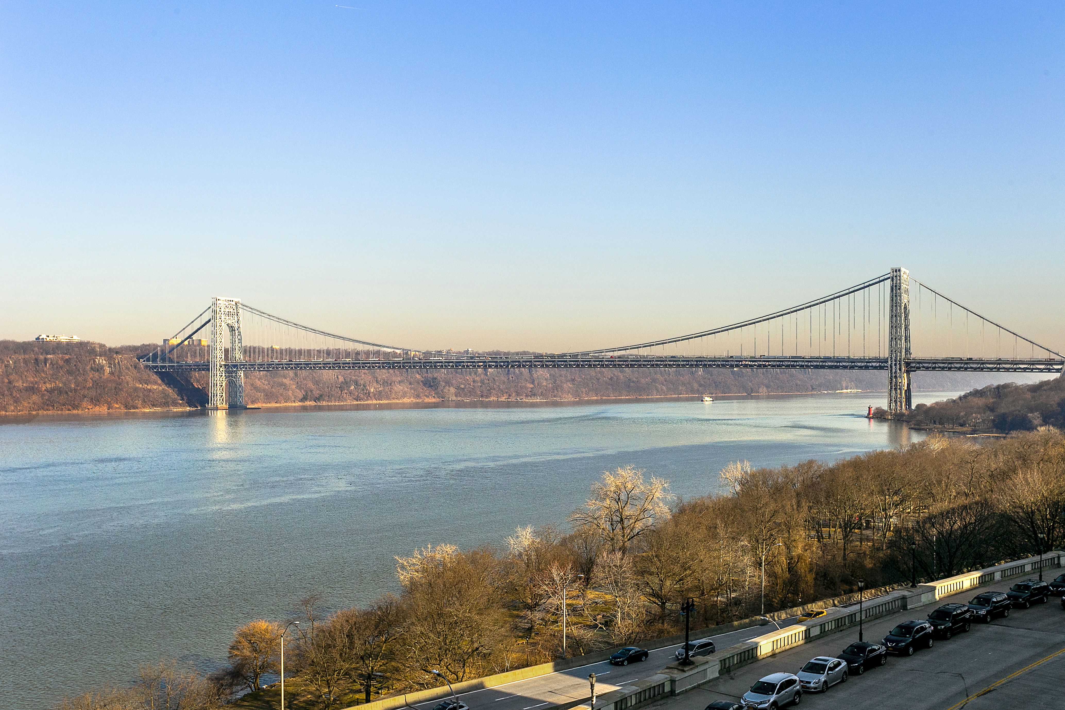 159-34 Riverside Drive West, Unit 7L90 Manhattan, NY 10032 - Photo 12 of 22 a view of a lake with a mountain