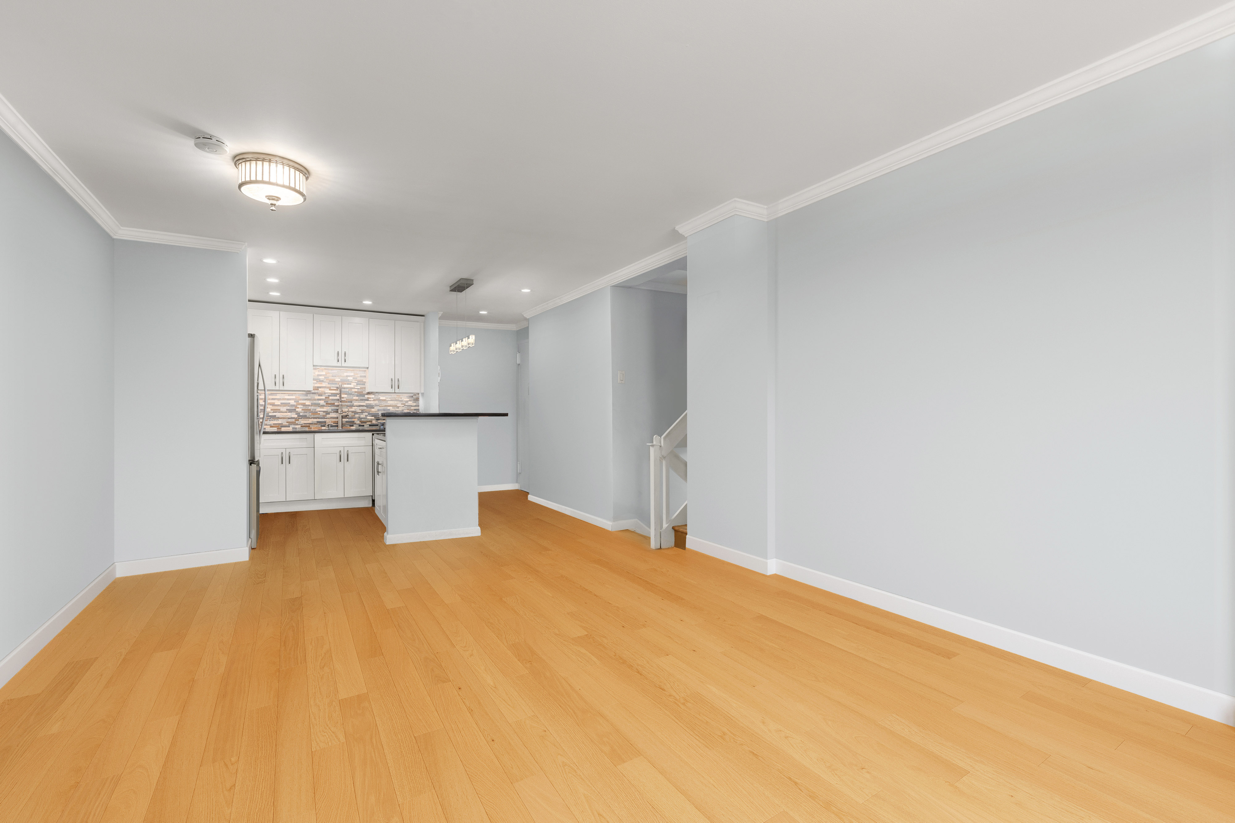 7 East 35th Street, Unit 2E Manhattan, NY 10016 - Photo 9 of 10 a view of a kitchen with a sink