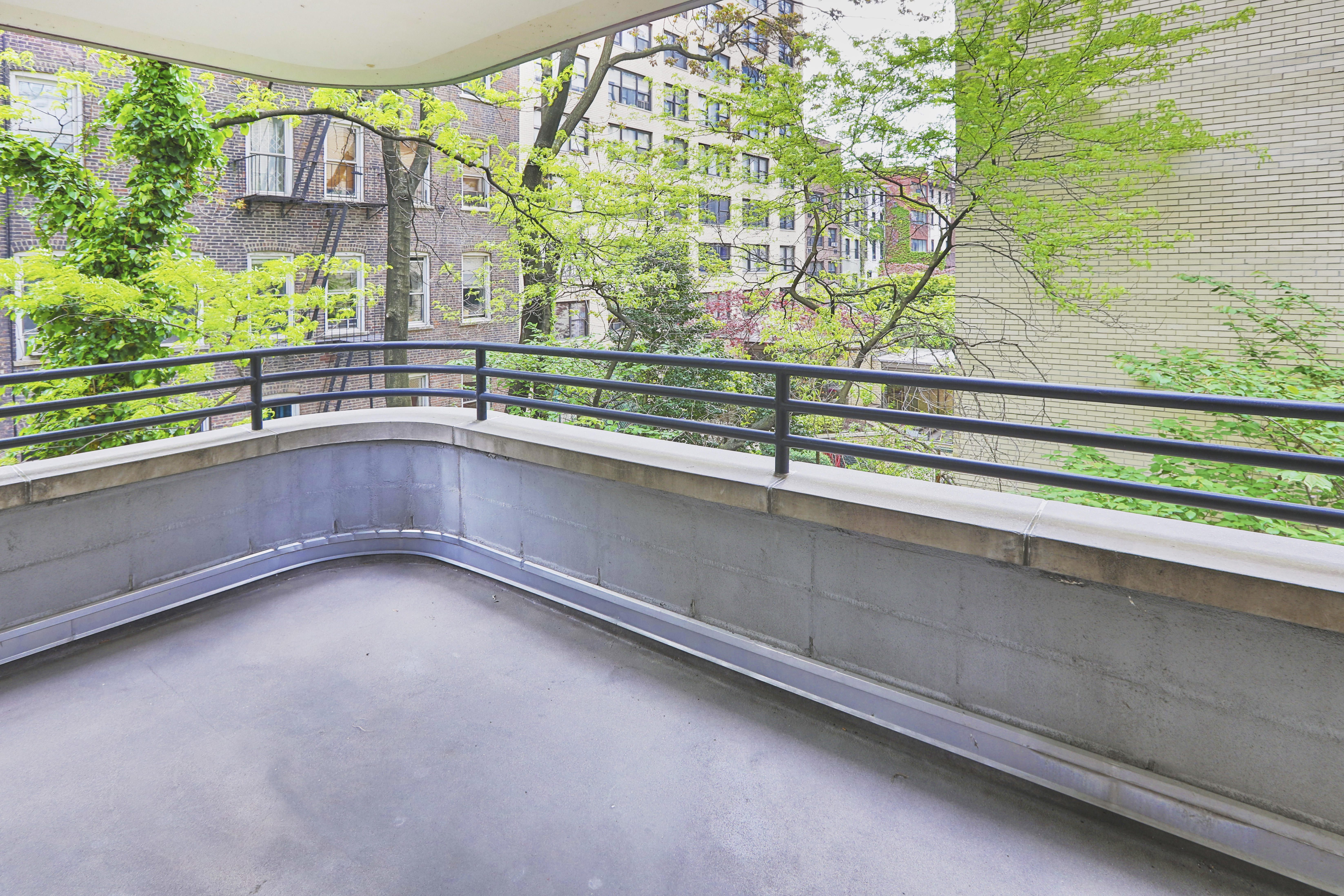 309 East 49th Street, Unit 3D Manhattan, NY 10017 - Photo 4 of 11 a view of a balcony with an outdoor space