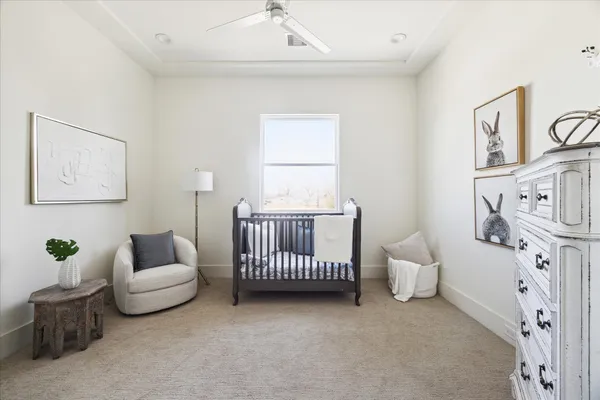 a bathroom with a double vanity sink mirror and