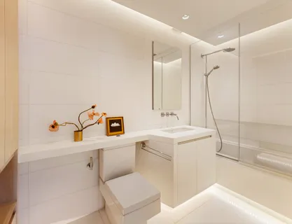 a close view of a sink and a mirror