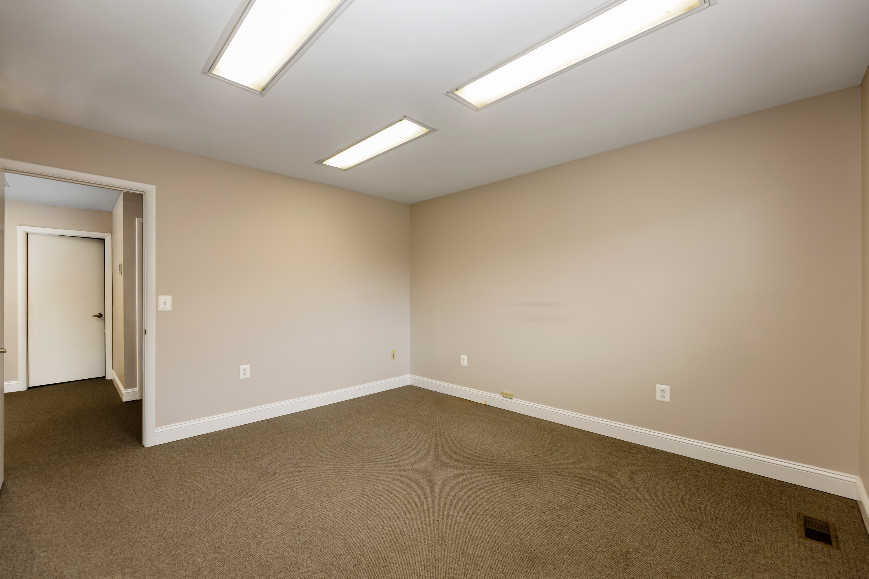 5885 Allentown Road Suitland, MD 20746 - Photo 3 of 23 an empty room with a empty space and windows