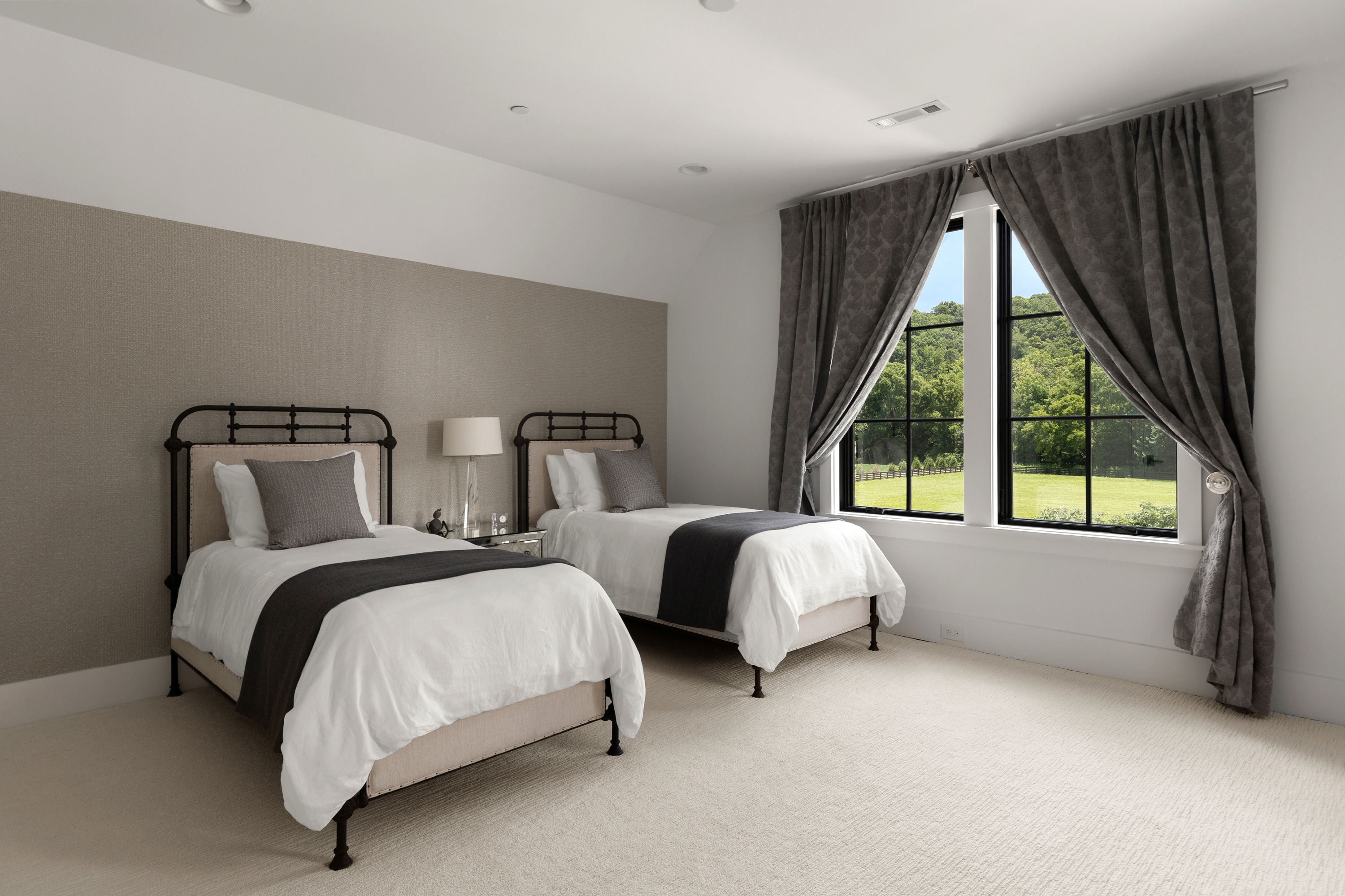 5747 Garrison Road Franklin, TN 37064 - Photo 35 of 47 a bed sitting in a bedroom next to a window