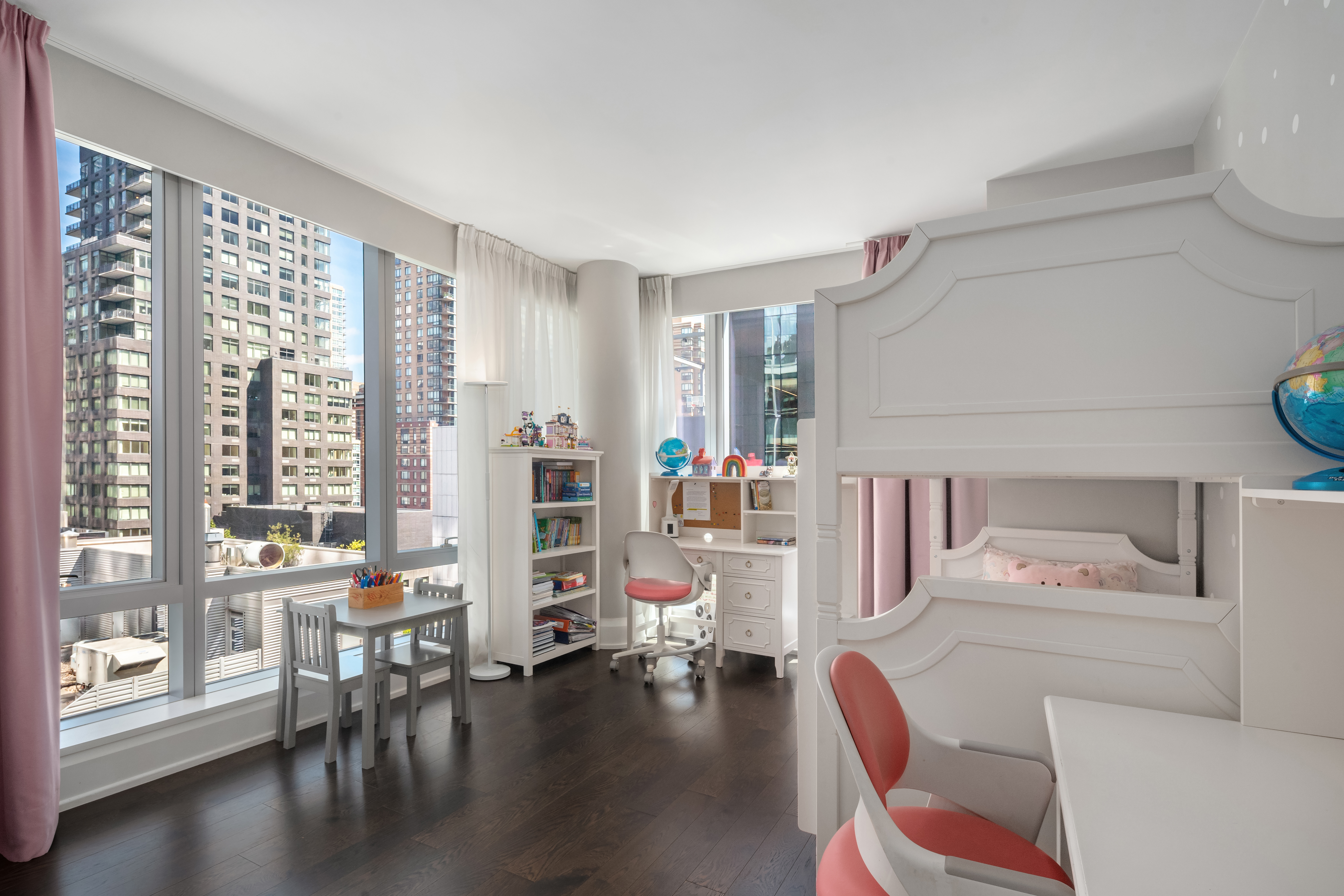 50 Riverside Boulevard, Unit 10P Manhattan, NY 10069 - Photo 11 of 21 a living room with furniture and a large window