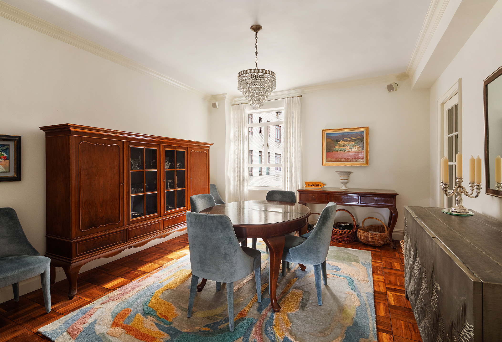 25 Central Park West, Unit 14R Manhattan, NY 10023 - Photo 3 of 22 a view of a dining room with furniture window and wooden floor