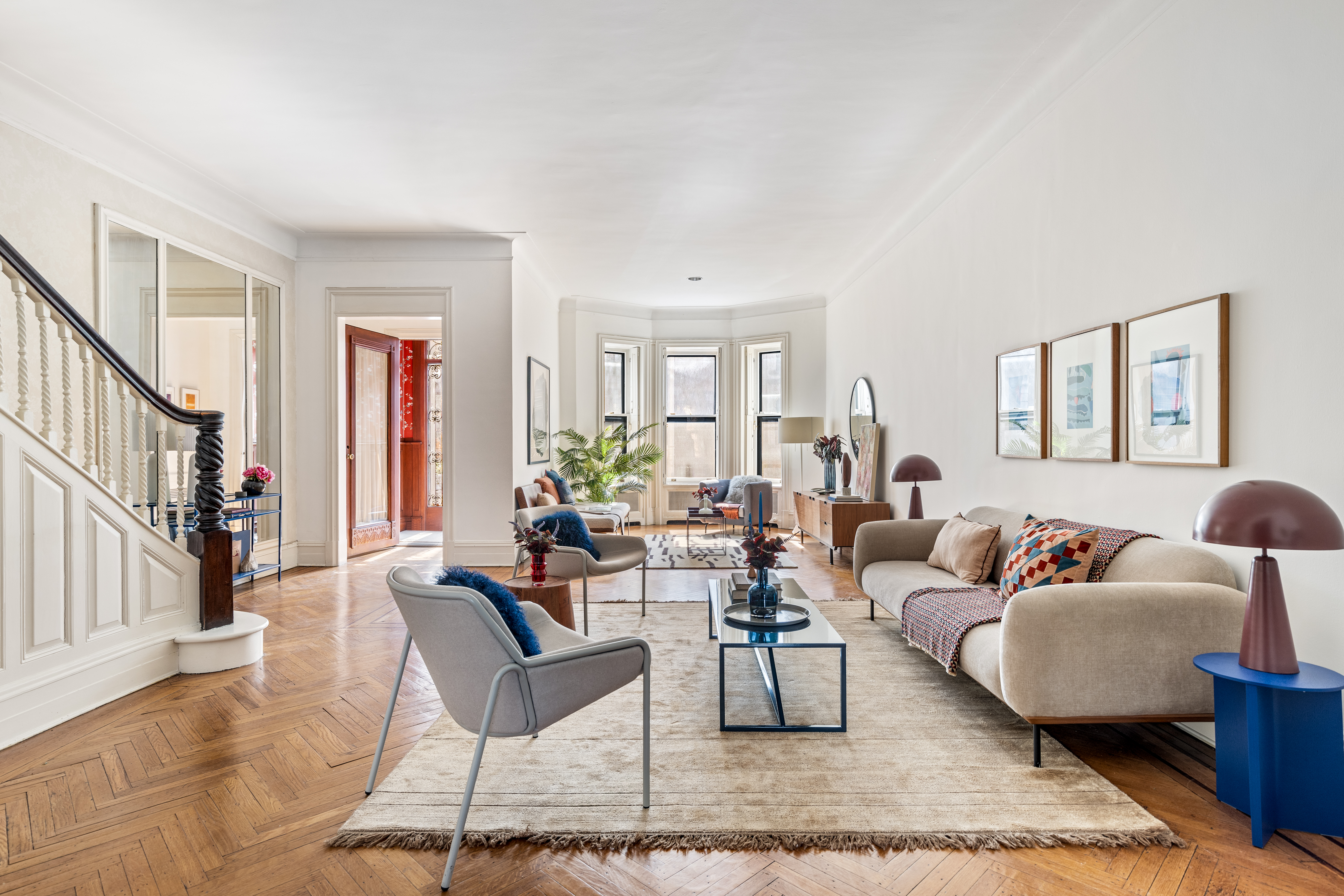 599 2nd Street Brooklyn, NY 11215 - Photo 2 of 16 a living room with furniture and a potted plant