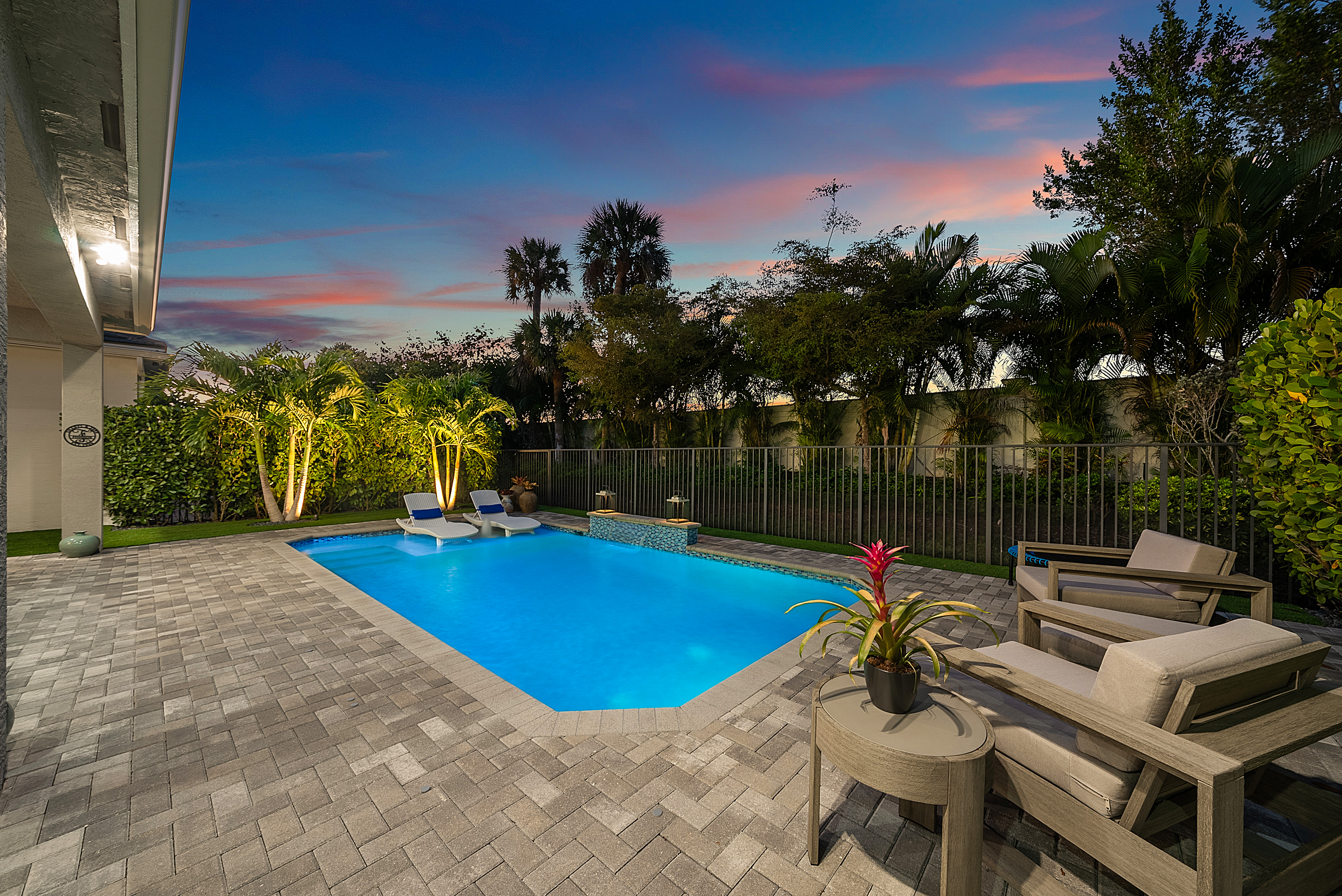 13172 Whistler Mountain Road Delray Beach, FL 33446 - Photo 5 of 38 a view of a swimming pool with lounge chairs in patio