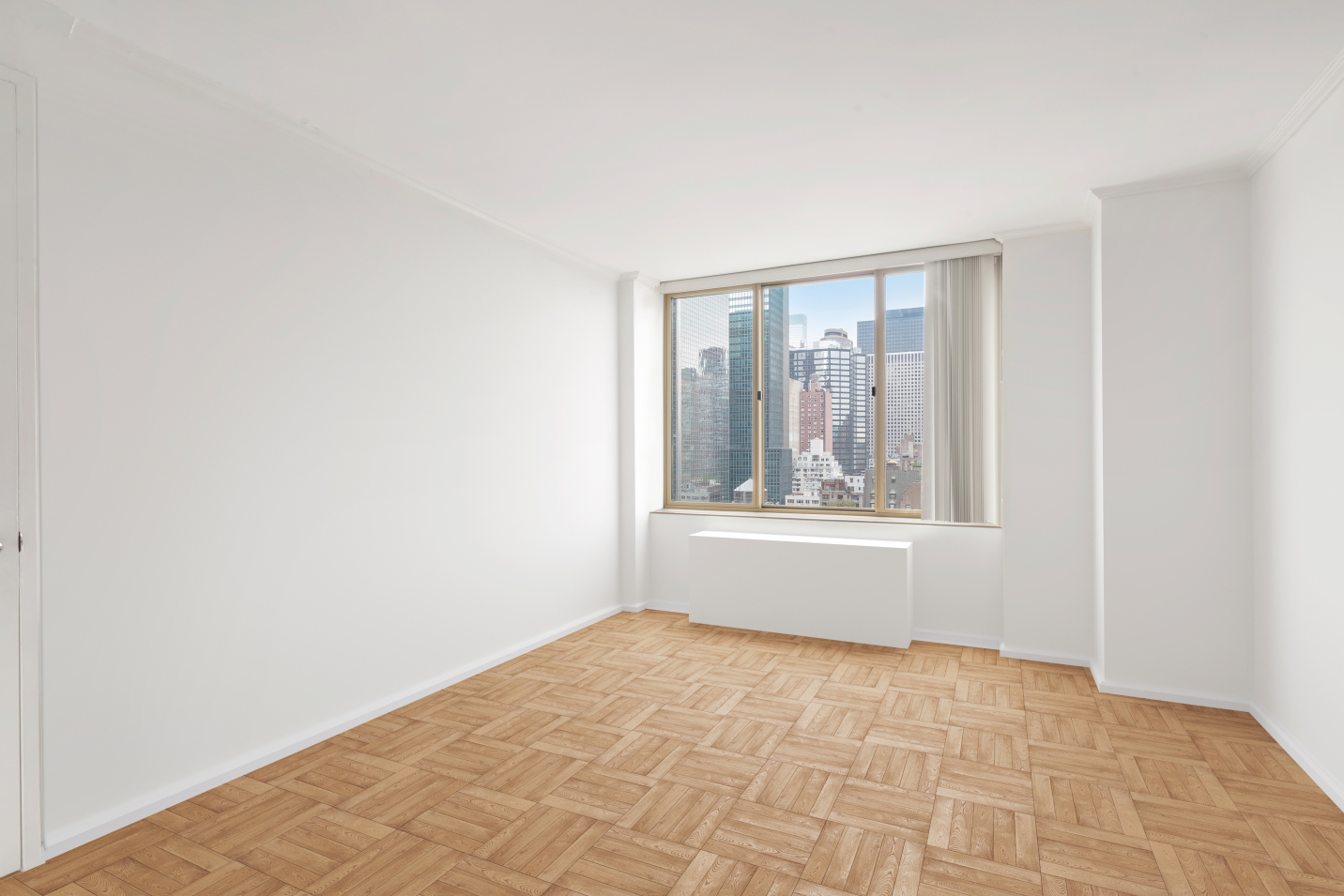 236 East 47th Street, Unit 15E Manhattan, NY 10017 - Photo 1 of 11 a view of an empty room with a window