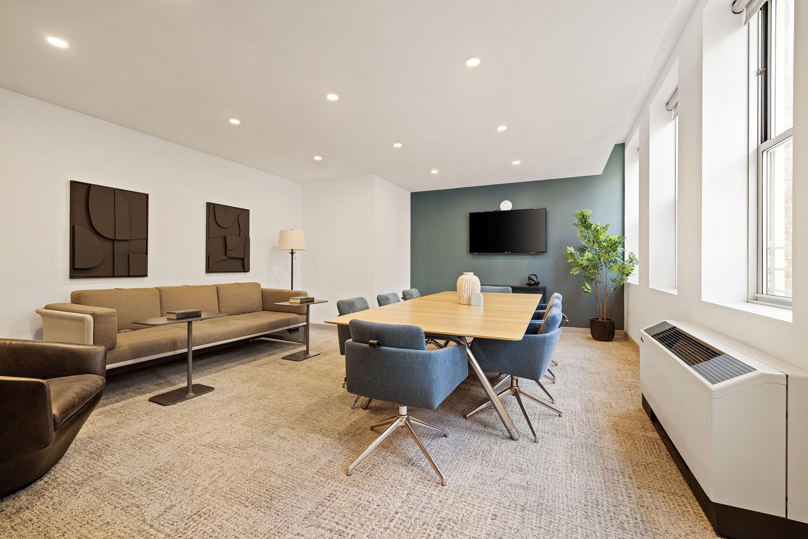 80 Chambers Street, Unit 11A Manhattan, NY 10007 - Photo 17 of 24 a living room with furniture and a flat screen tv