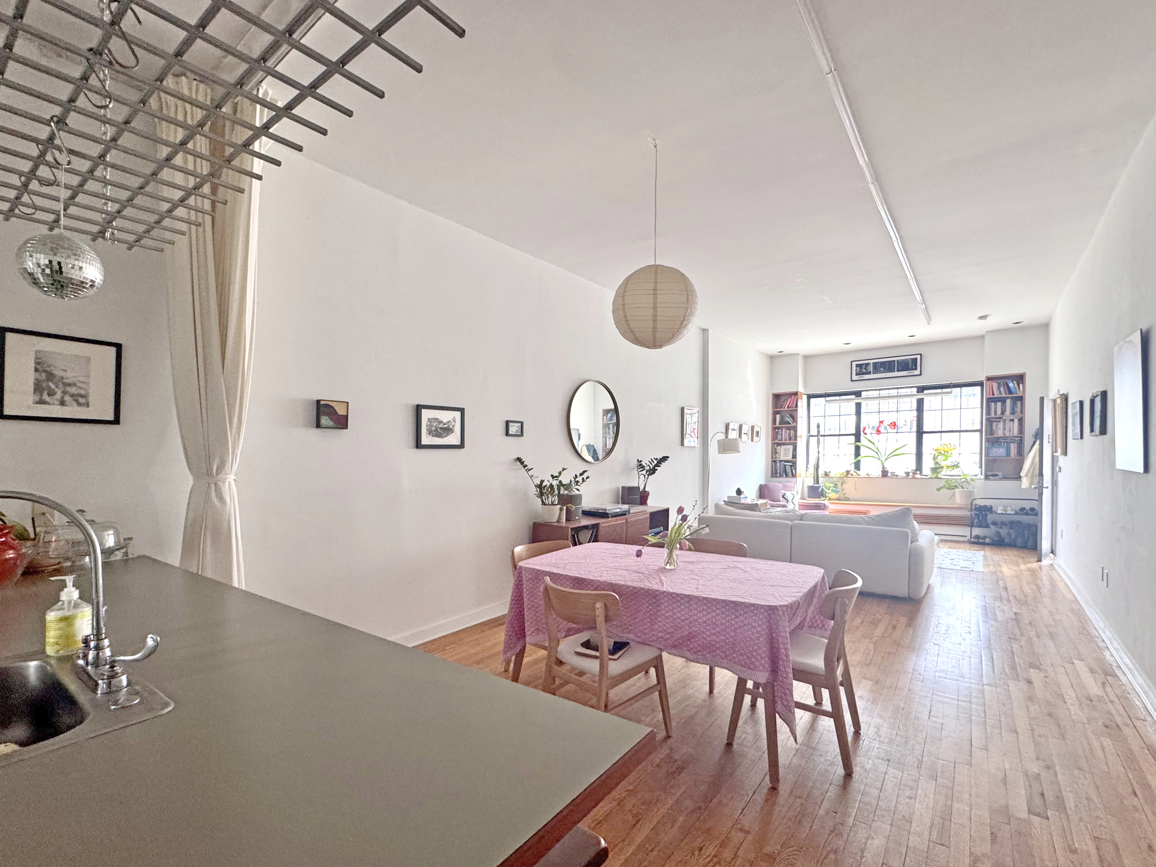 658 Classon Avenue Brooklyn, NY 11238 - Photo 5 of 15 a view of a dining room with furniture window and wooden floor