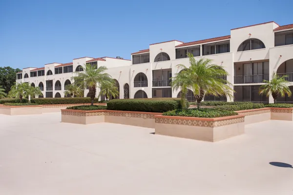 a front view of building with yard
