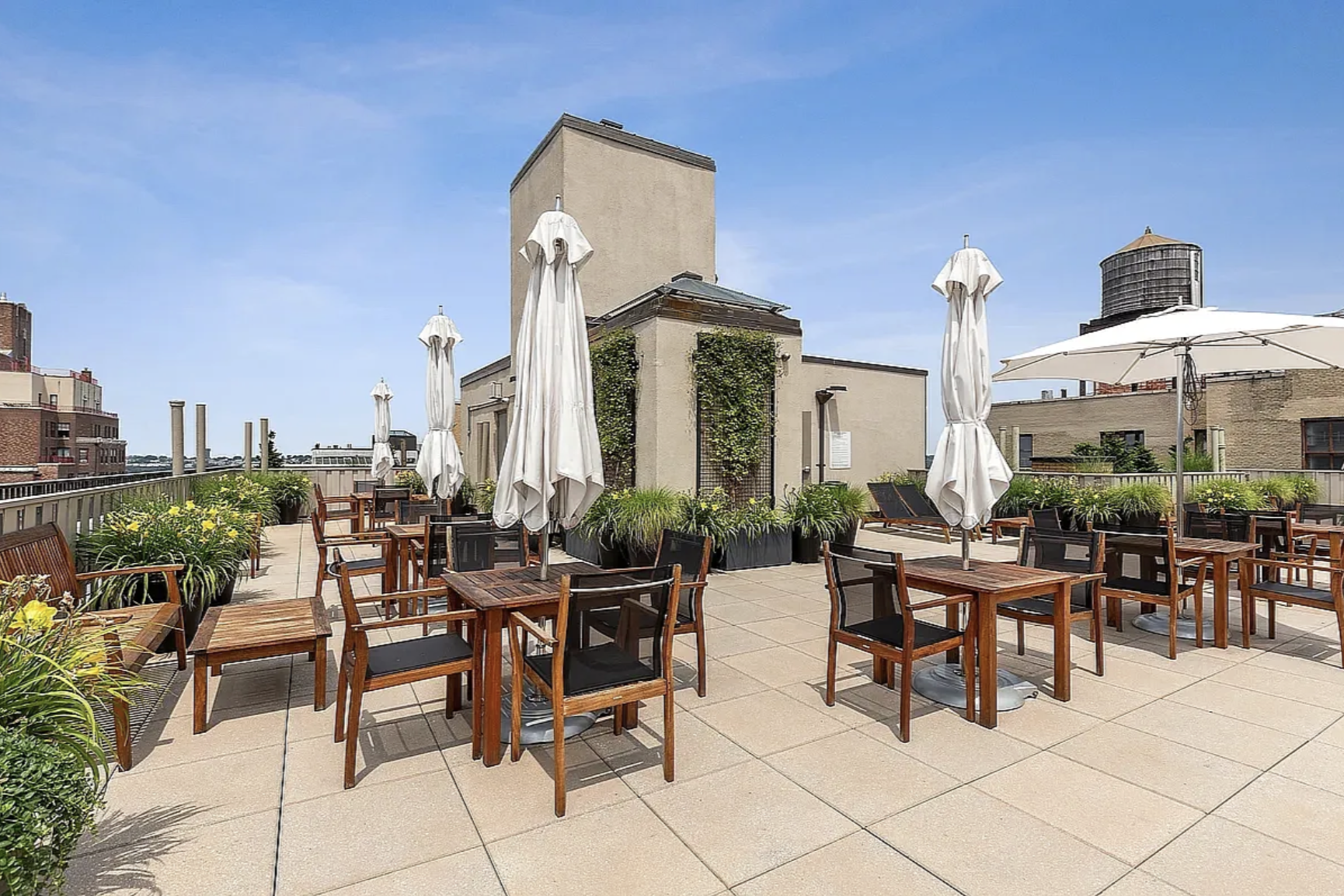 905 West End Avenue, Unit 112 Manhattan, NY 10025 - Photo 10 of 12 a view of a tables and chairs in patio