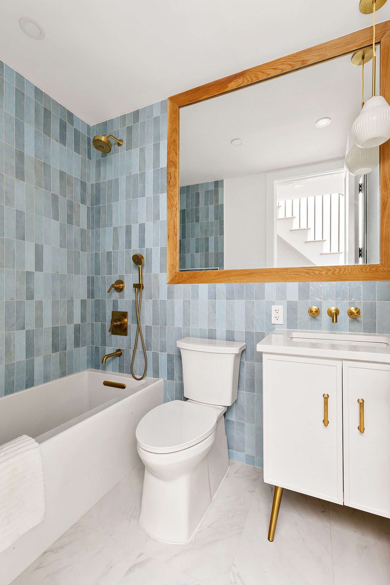 185 Ainslie Street, Unit 3 Brooklyn, NY 11211 - Photo 7 of 12 a bathroom with a sink a toilet and bathtub