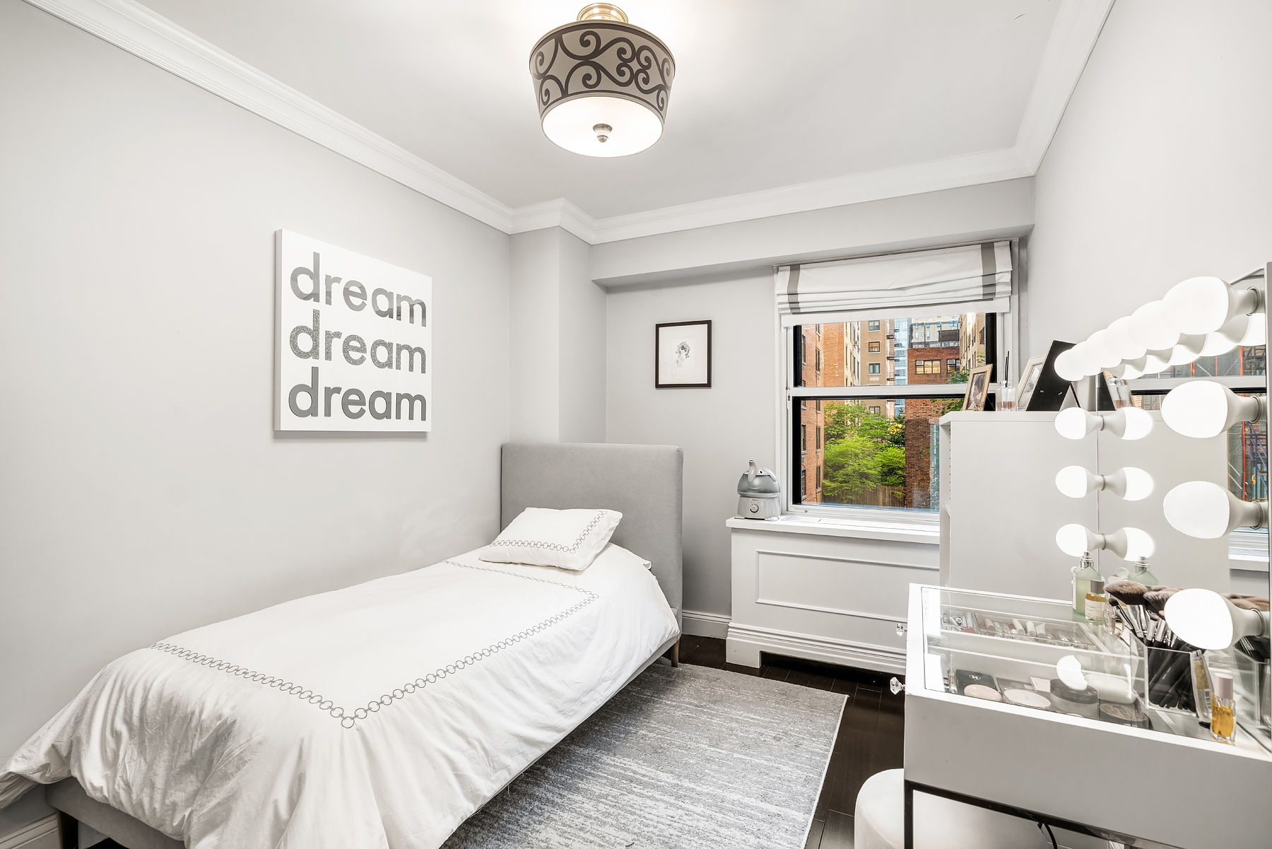 178 East 80th Street, Unit 3A Manhattan, NY 10075 - Photo 6 of 14 a bedroom with a bed and a window