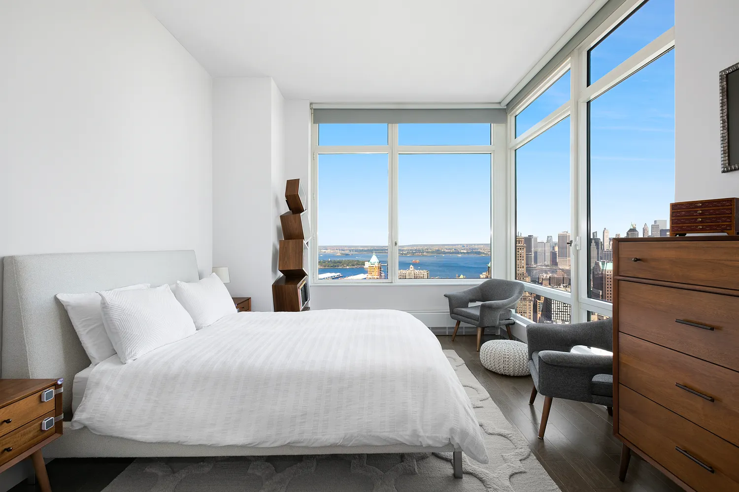 a bedroom with bed and balcony