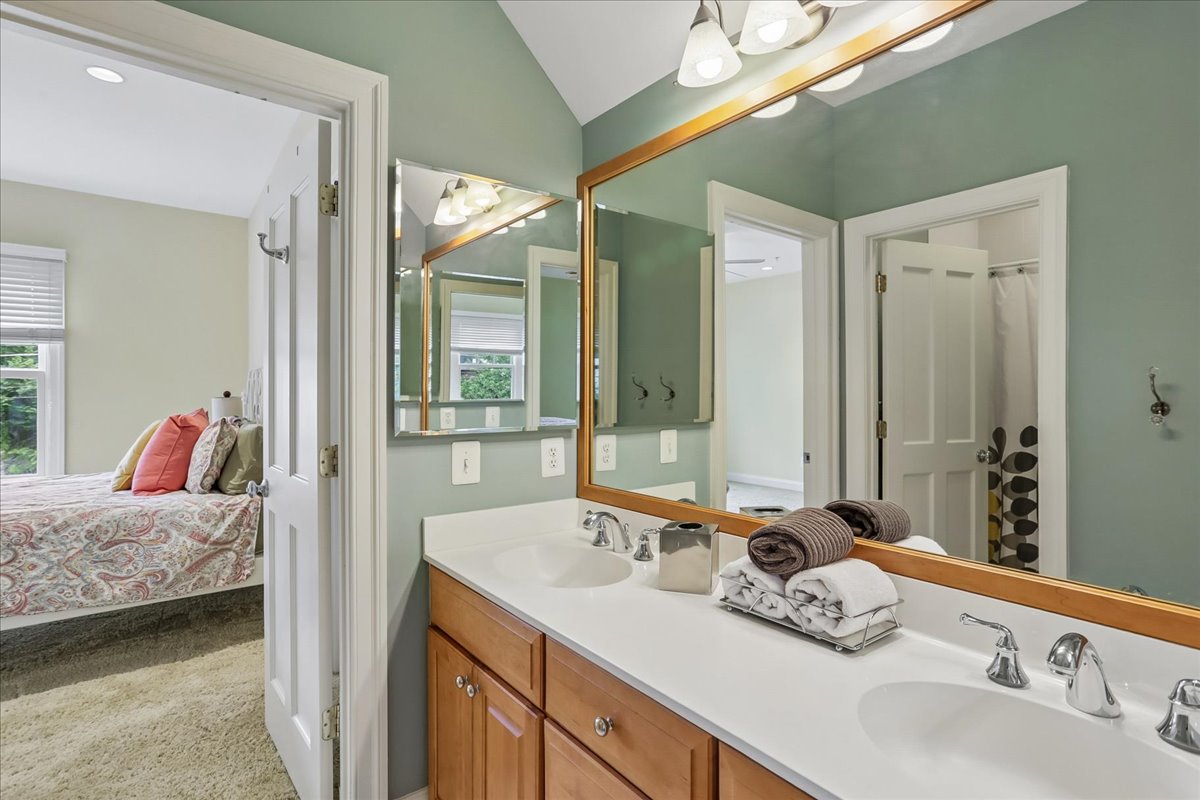 11736 Gainsborough Road Potomac, MD 20854 - Photo 80 of 90 a en suite bathroom with sinks mirror and double