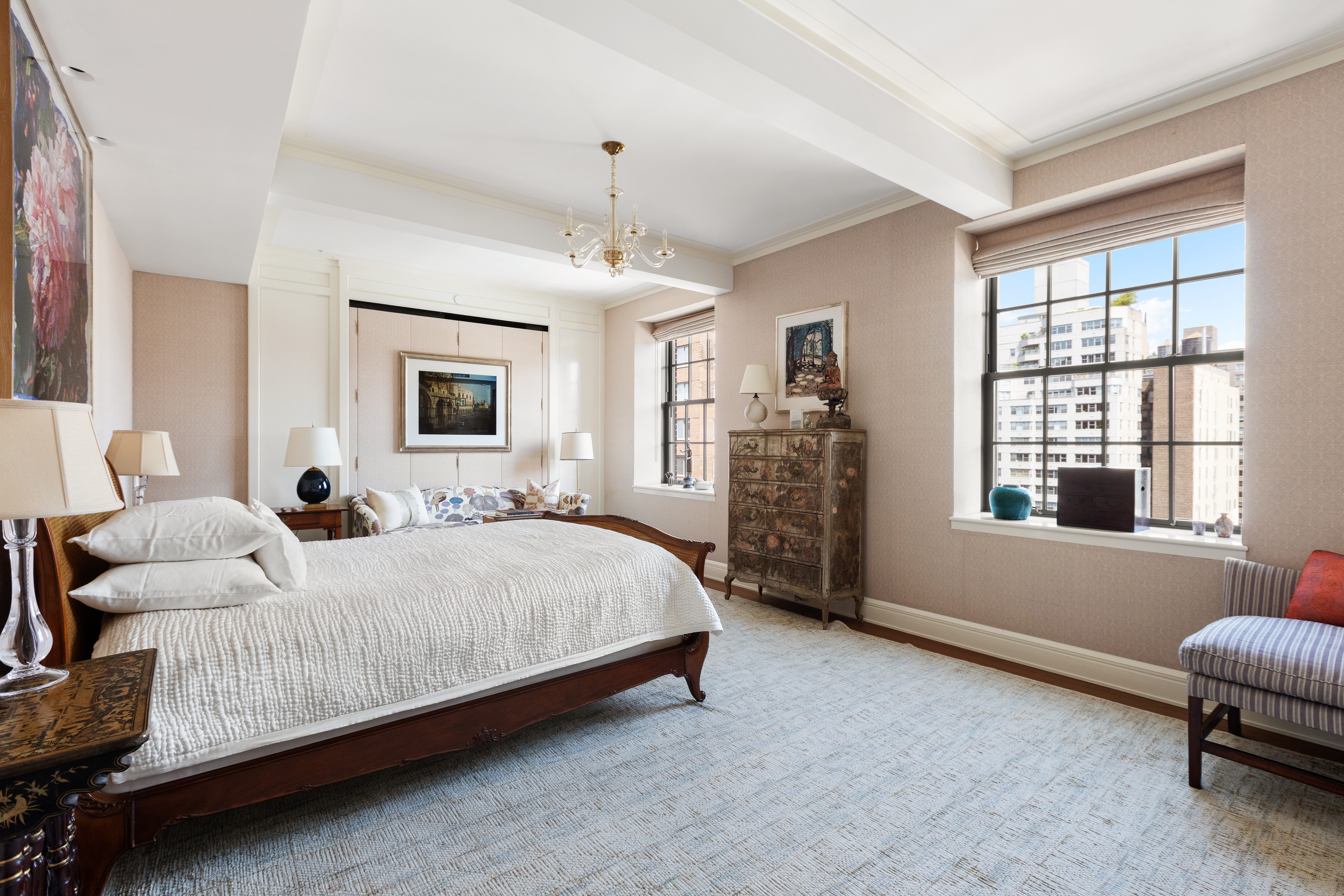 160 West 12th Street, Unit 104 Manhattan, NY 10011 - Photo 9 of 28 a spacious bedroom with a bed couch and a window