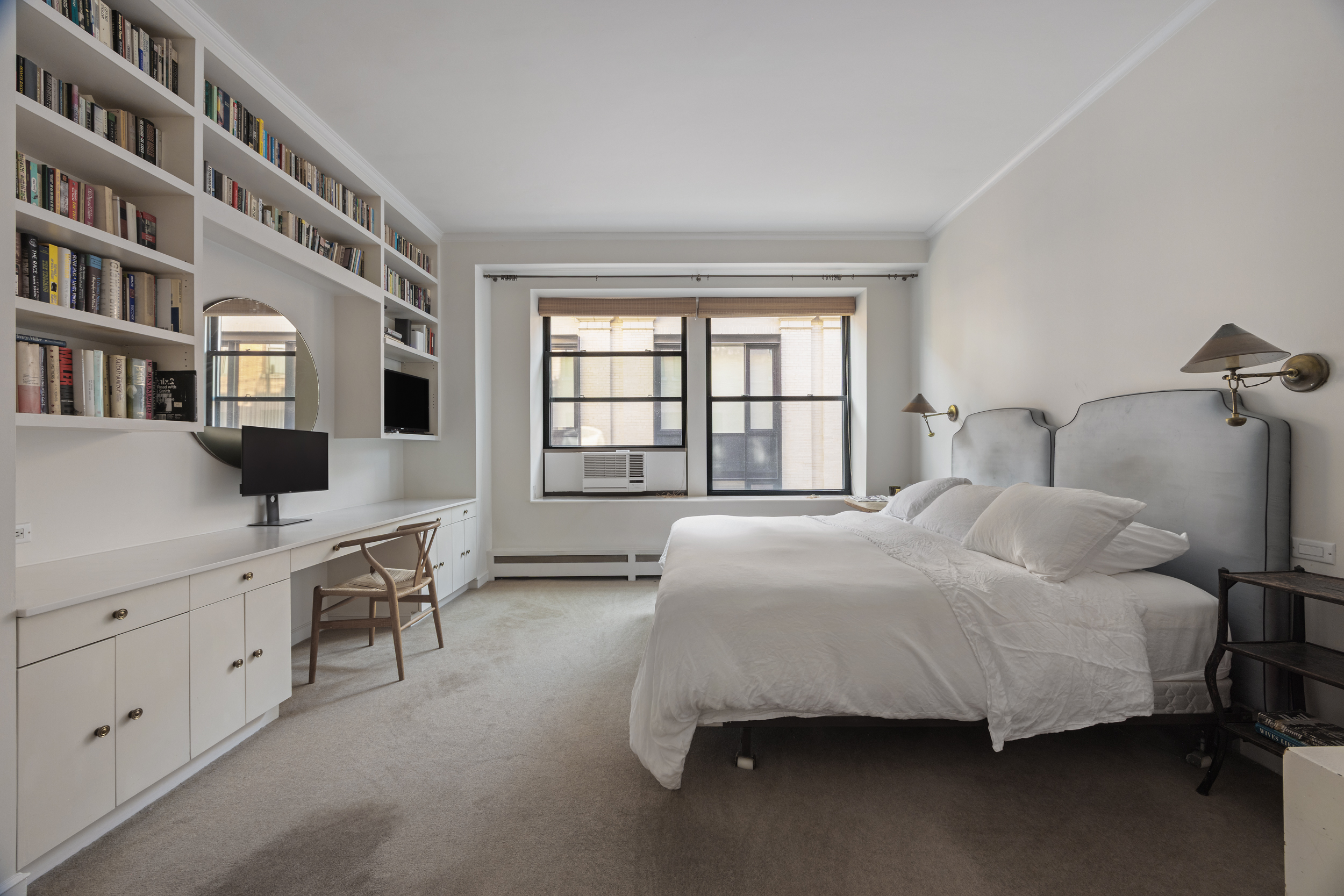 260 West Broadway, Unit 10D Manhattan, NY 10013 - Photo 12 of 20 a bedroom with a bed and a window