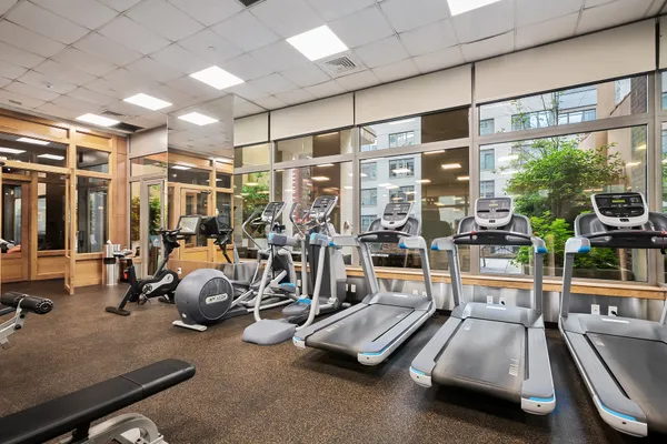 a view of a room with gym equipment