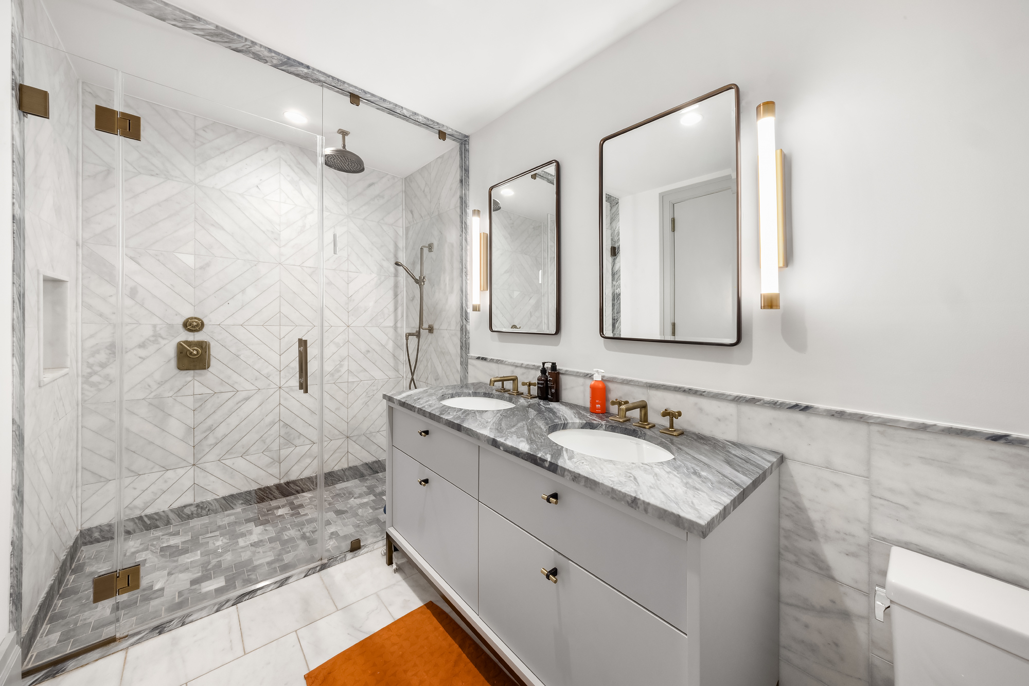 76 Schermerhorn Street, Unit 4C Brooklyn, NY 11201 - Photo 8 of 10 a bathroom with a granite countertop sink mirror and double