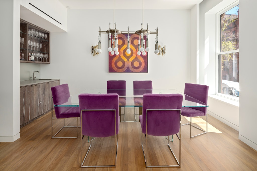 125 West 87th Street Manhattan, NY 10024 - Photo 4 of 27 a view of a dining room with furniture and wooden floor