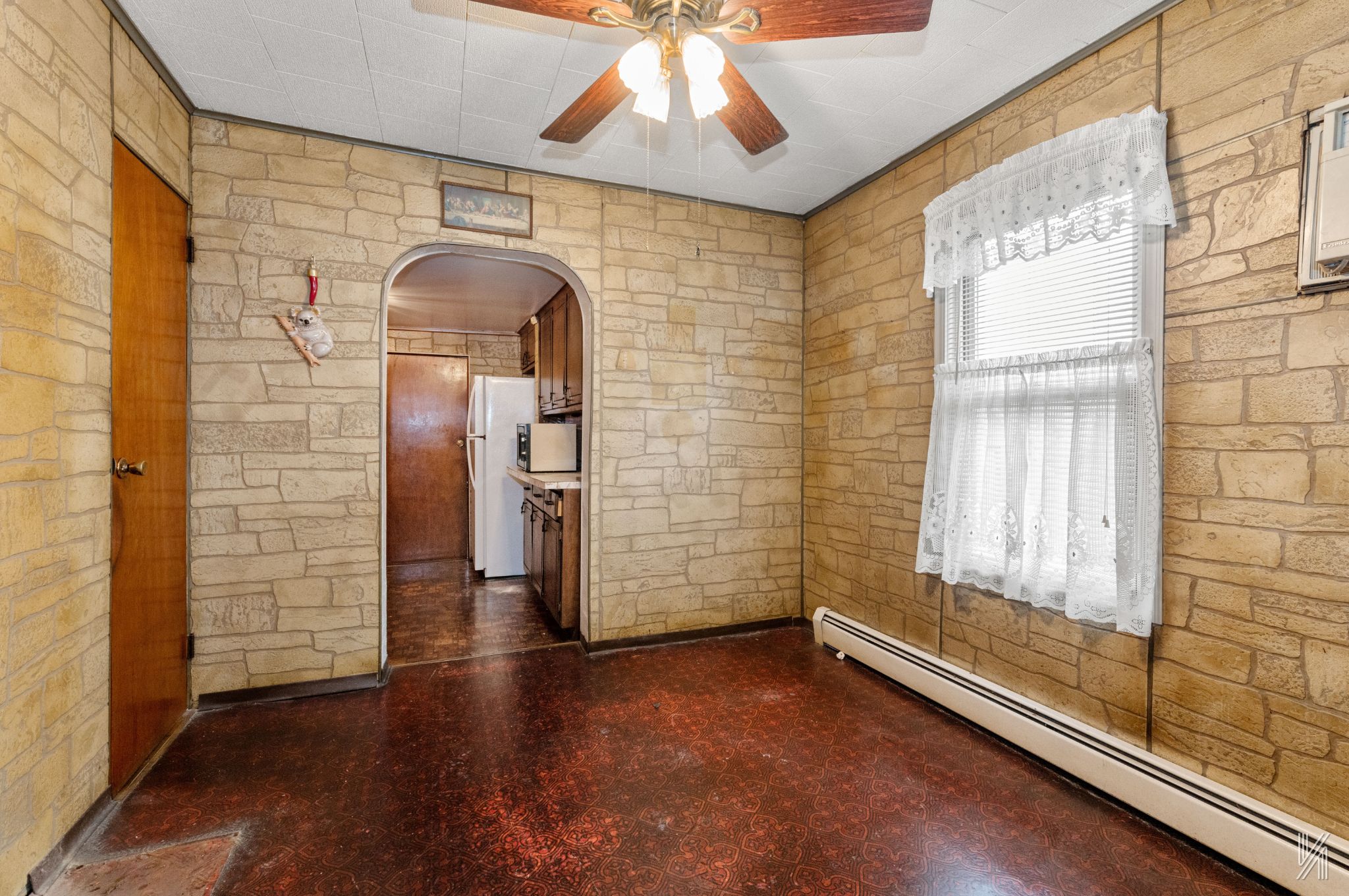 135-16 95th Street Queens, NY 11417 - Photo 9 of 21 a view of a hallway with wooden floor and front door
