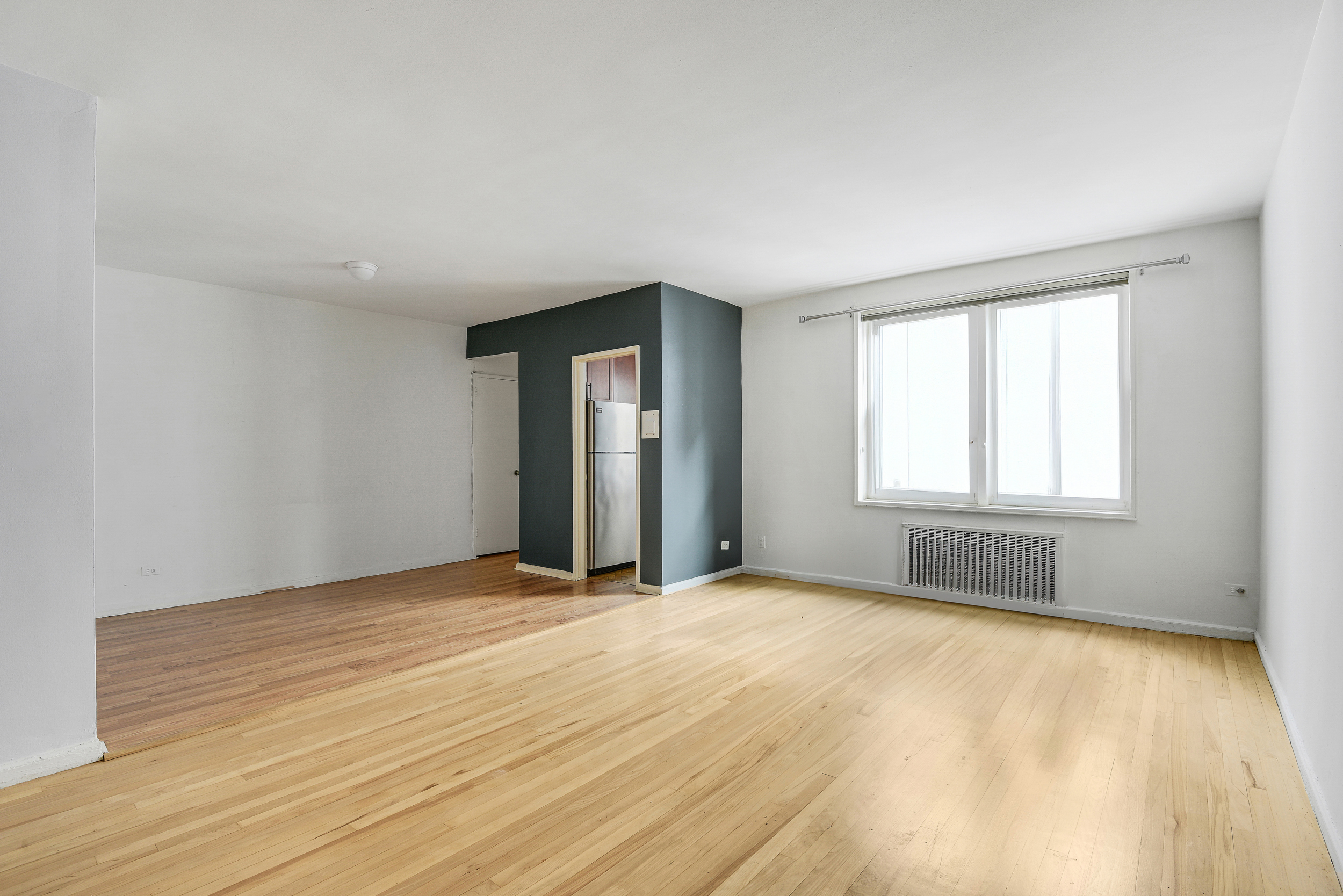 9801 Shore Road, Unit 4P Brooklyn, NY 11209 - Photo 3 of 13 a view of an empty room with a window