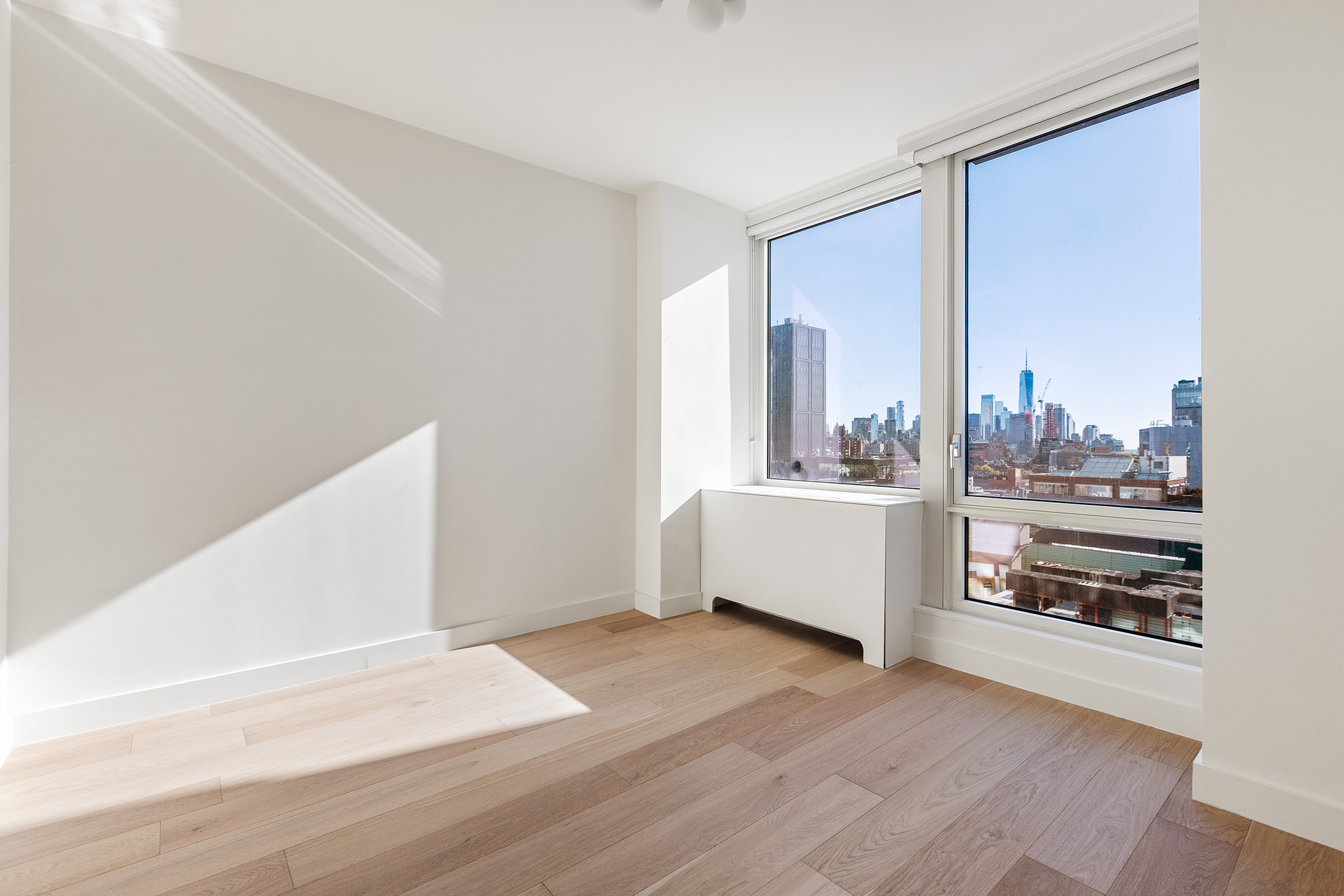 450 West 17th Street, Unit 1709 Manhattan, NY 10011 - Photo 15 of 27 a view of a kitchen with a sink and dishwasher