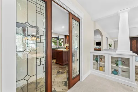 a kitchen with stainless steel appliances granite countertop a stove top oven and cabinets