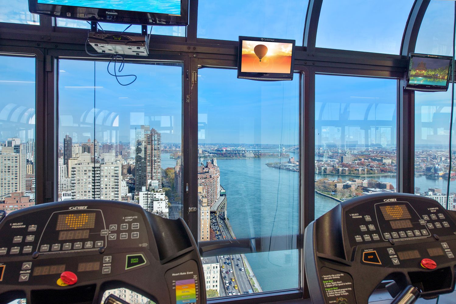 530 East 76th Street, Unit 10H Manhattan, NY 10021 - Photo 23 of 26 a front view of a house with a balcony