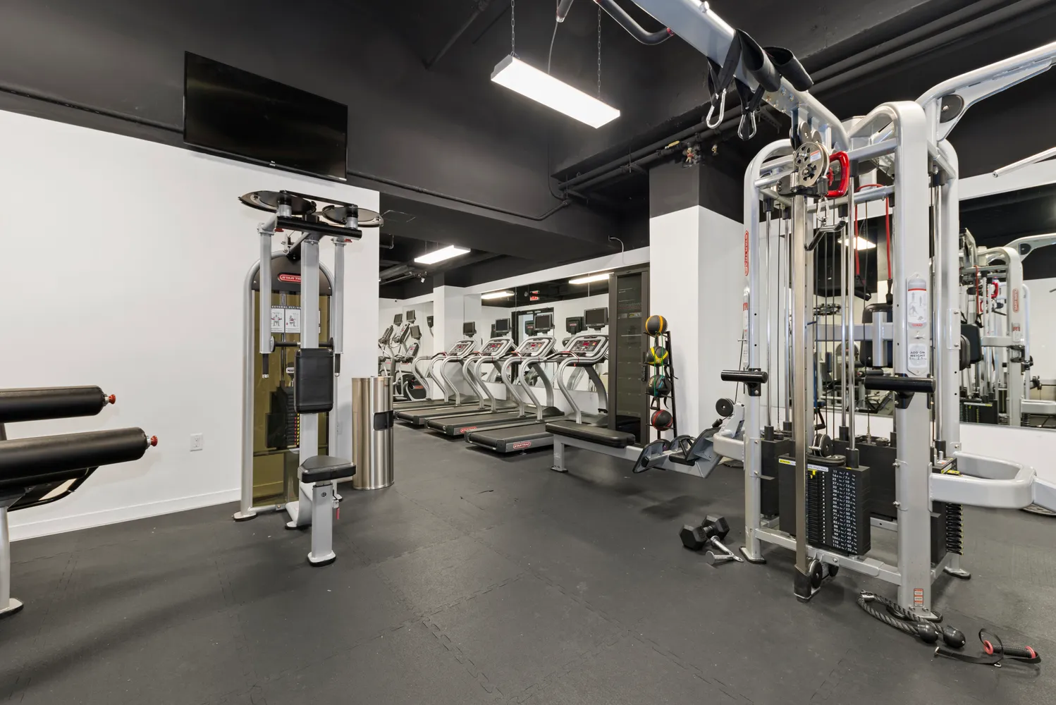 a view of a room with gym equipment