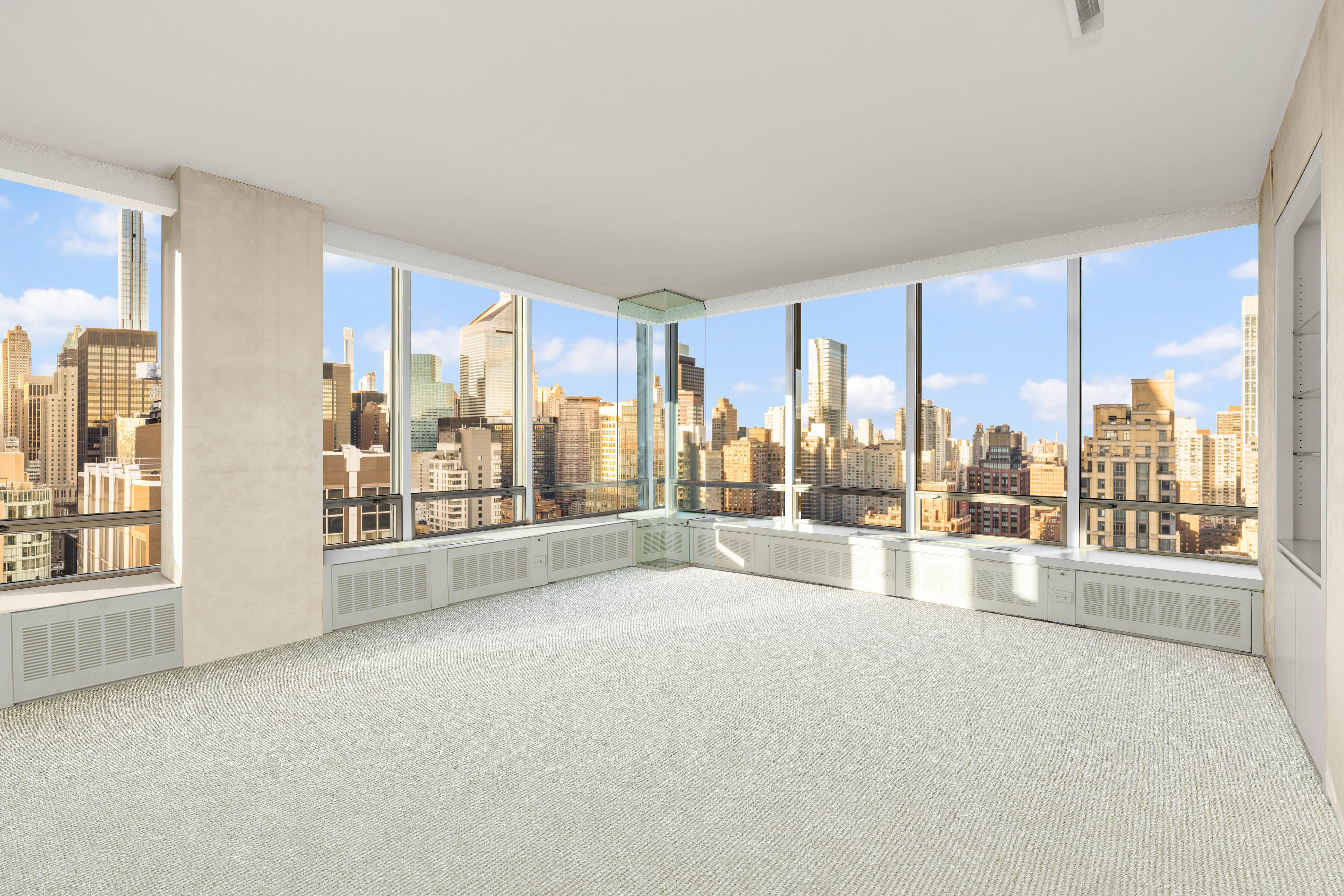 860 United Nations Plaza, Unit 36D Manhattan, NY 10017 - Photo 8 of 21 a view of an empty room with a window
