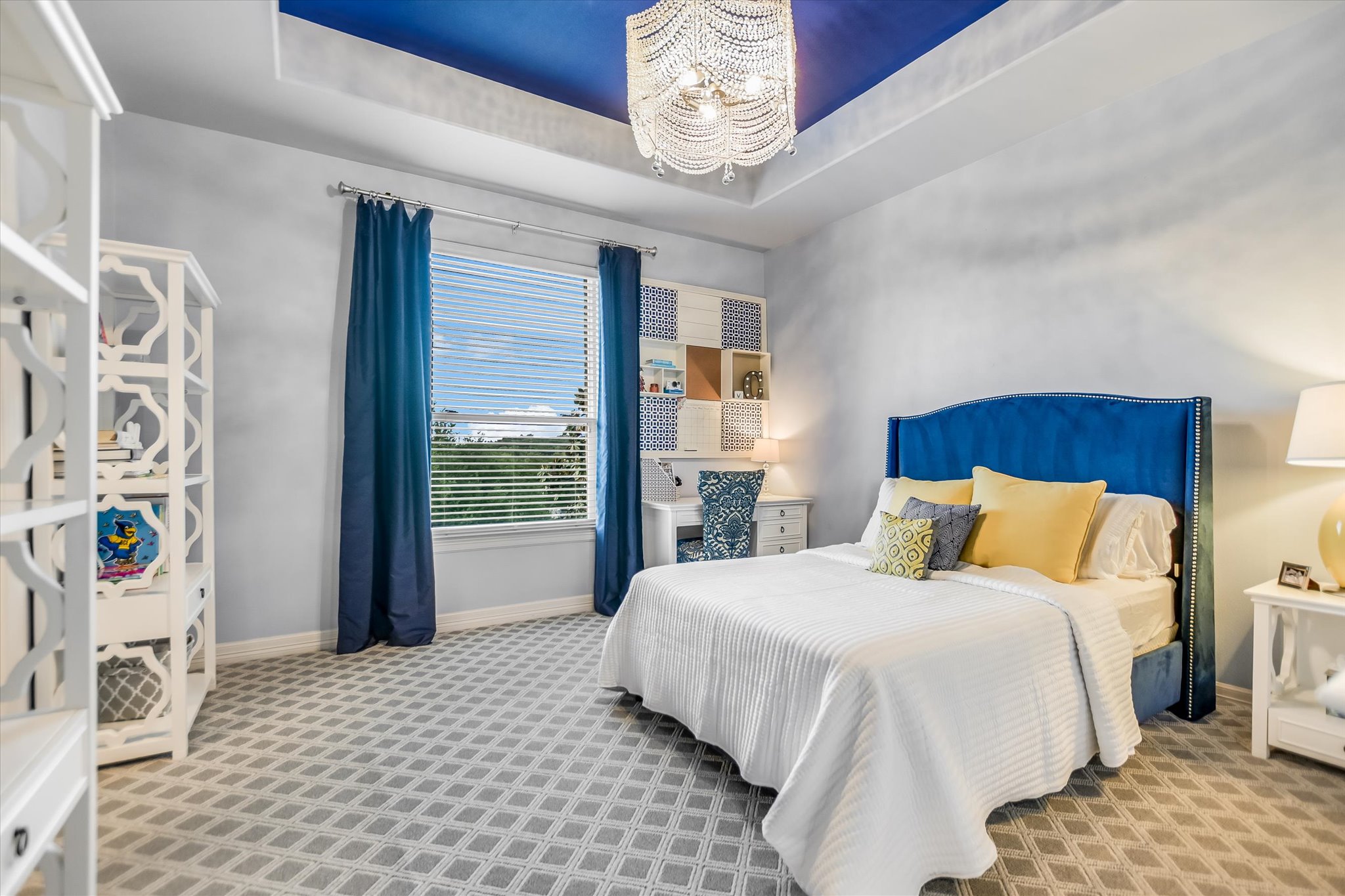 1422 Palomino Ridge Drive Austin, TX 78733 - Photo 39 of 60 a bedroom with a bed and a window
