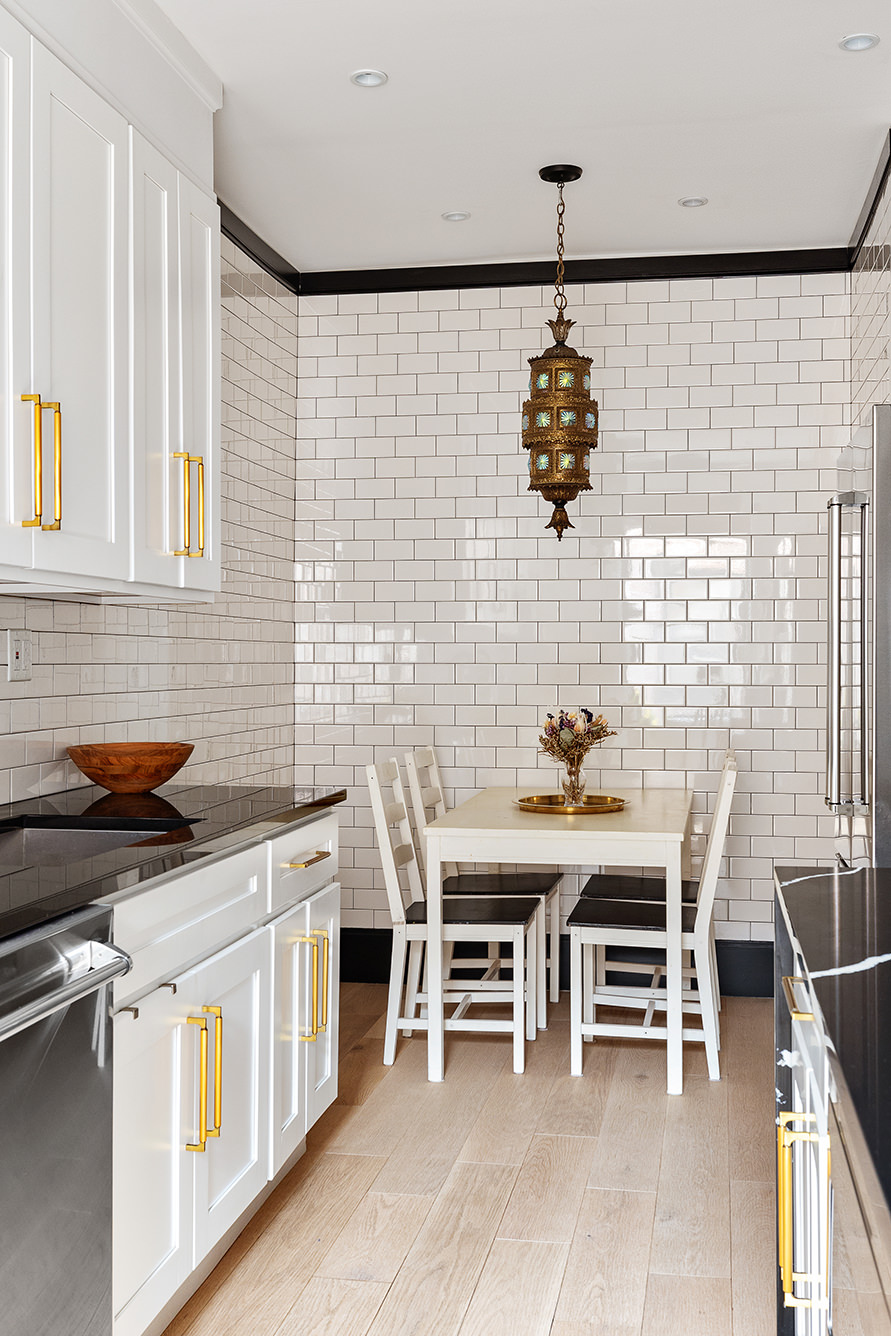 163 Ocean Avenue, Unit G6 Brooklyn, NY 11225 - Photo 3 of 12 a dining room with a table chairs and a stove top oven