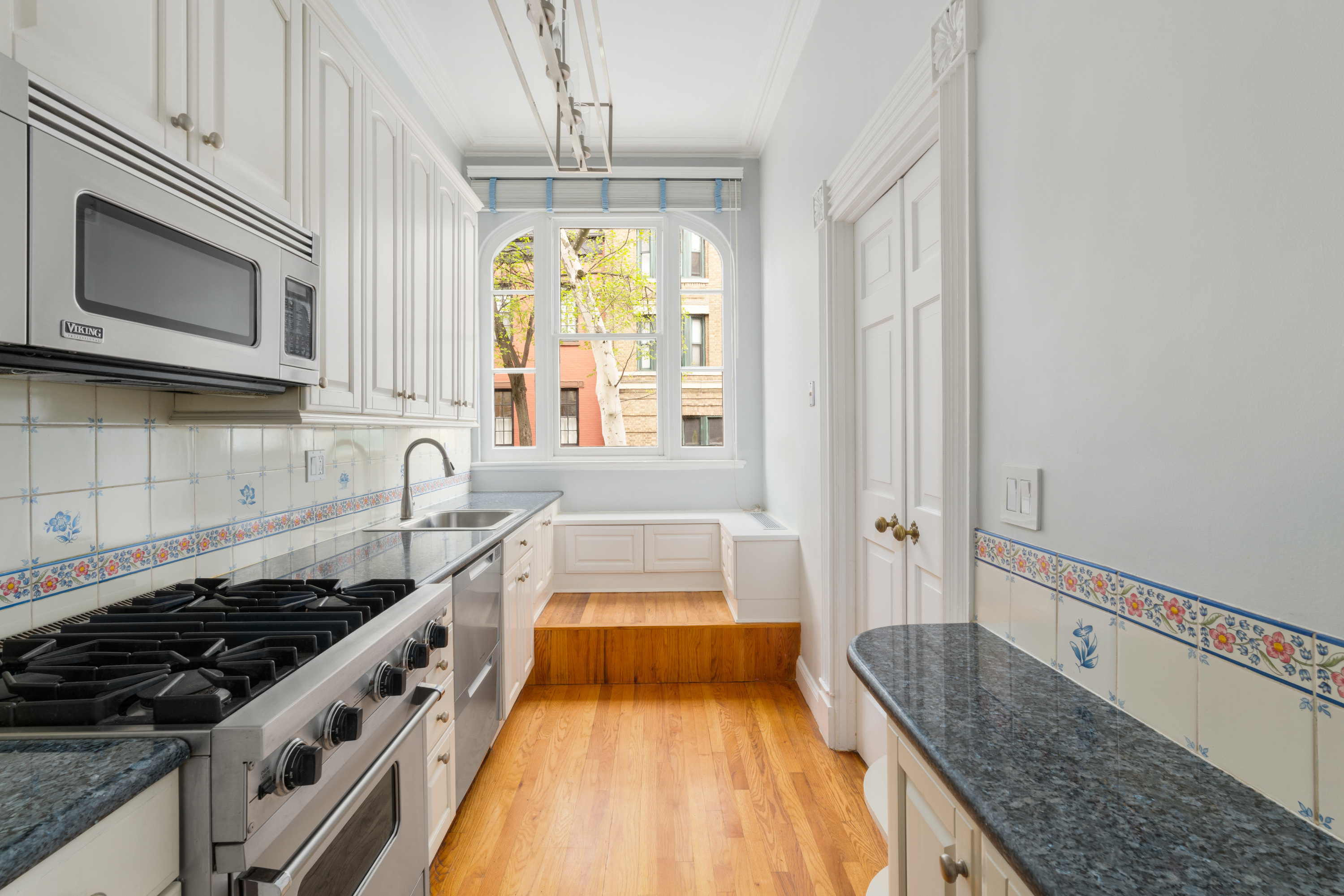 60 Hicks Street Brooklyn, NY 11201 - Photo 6 of 22 a kitchen with a sink stove and microwave