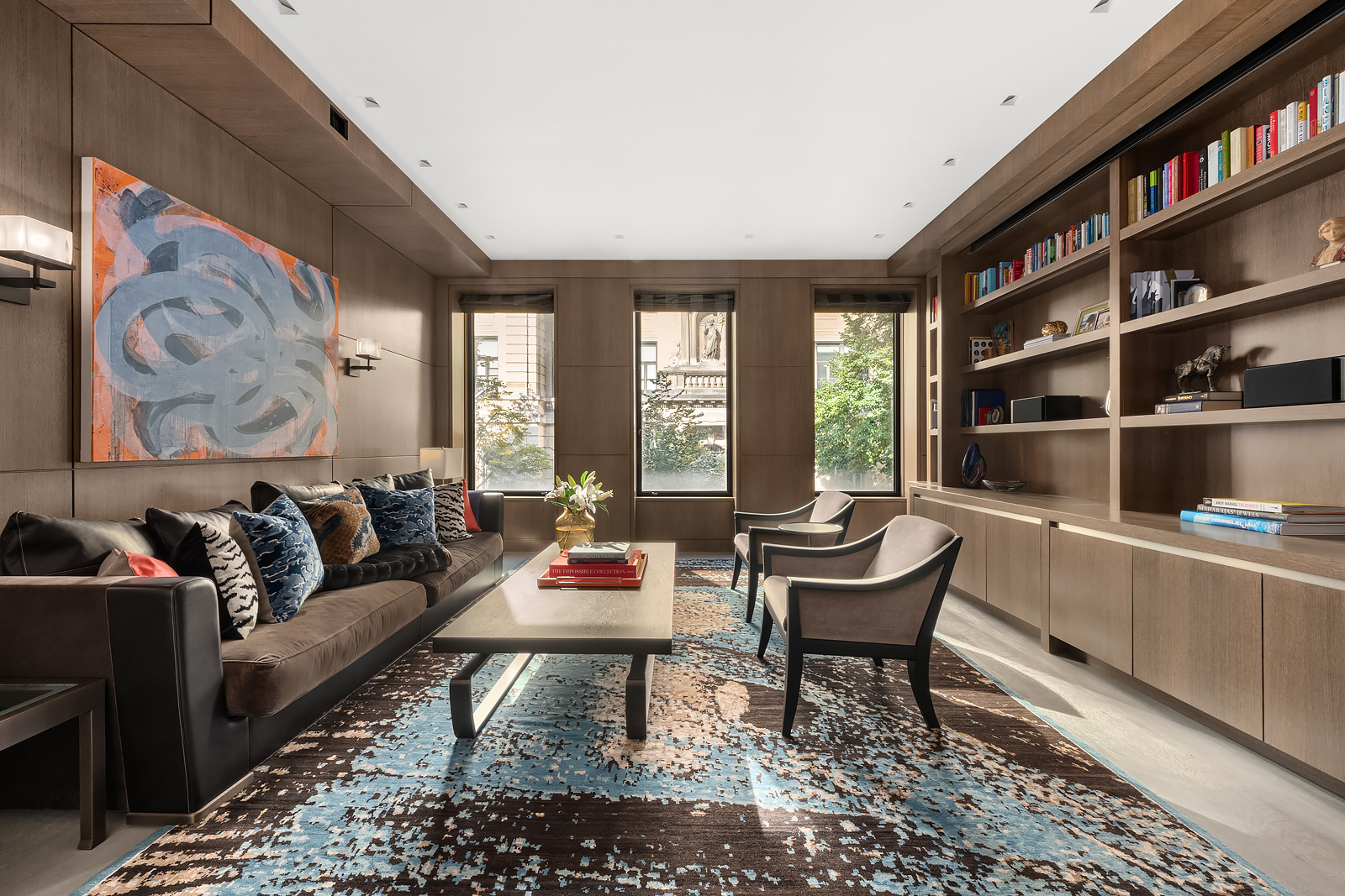 184 East 75th Street Manhattan, NY 10021 - Photo 8 of 20 a living room with furniture and a large window