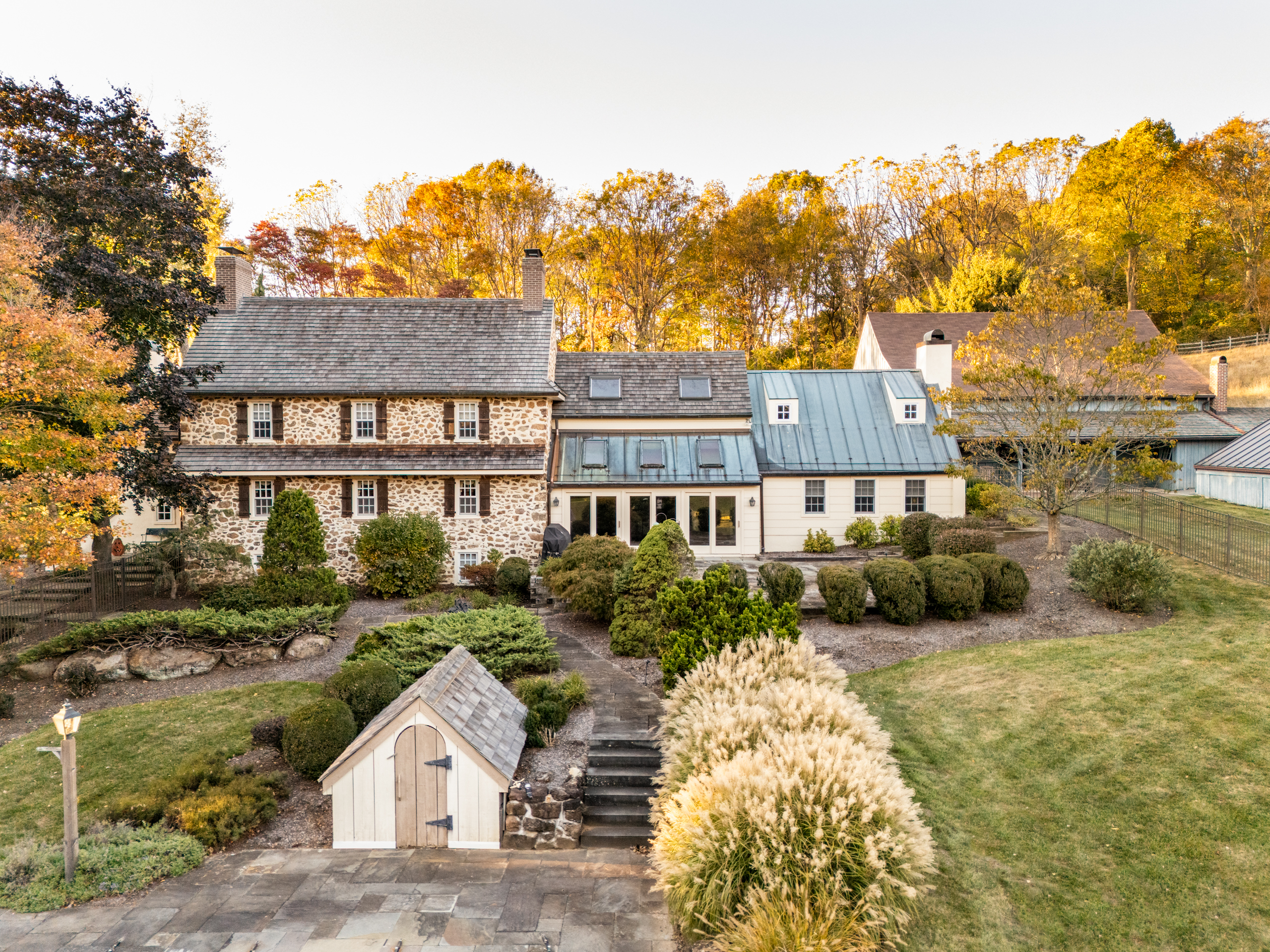a front view of a house with garden