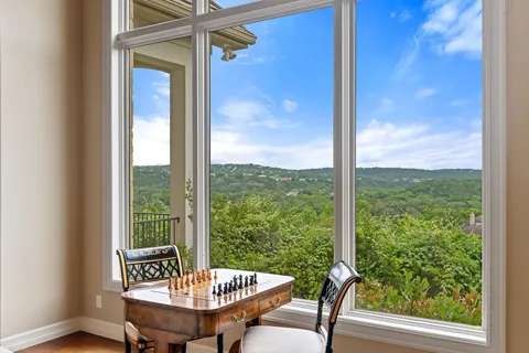 a view of a room with a furniture and deck