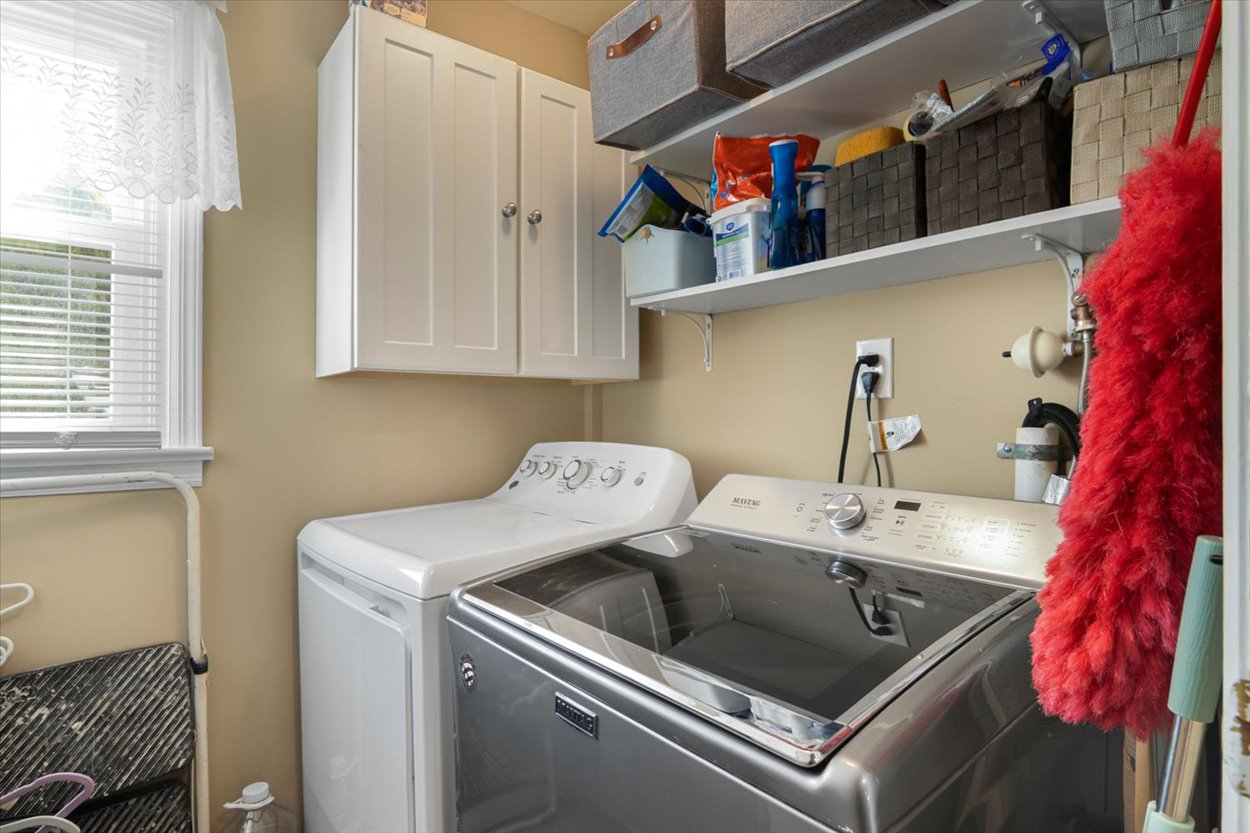 107 Kingston Road Parsippany, NJ 07054 - Photo 15 of 43 a utility room with dryer and washer
