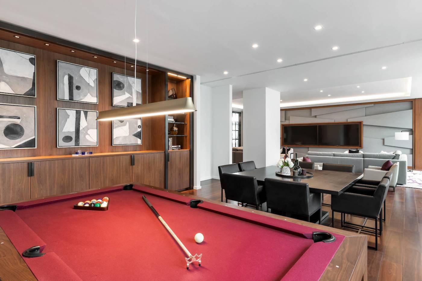 1 West End Avenue, Unit 15J Manhattan, NY 10023 - Photo 16 of 20 a room with furniture pool table flat screen tv and windows