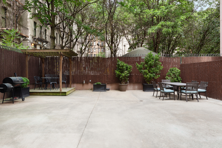 1810 3rd Avenue, Unit A7C Manhattan, NY 10029 - Photo 9 of 12 a view of table and chairs in patio