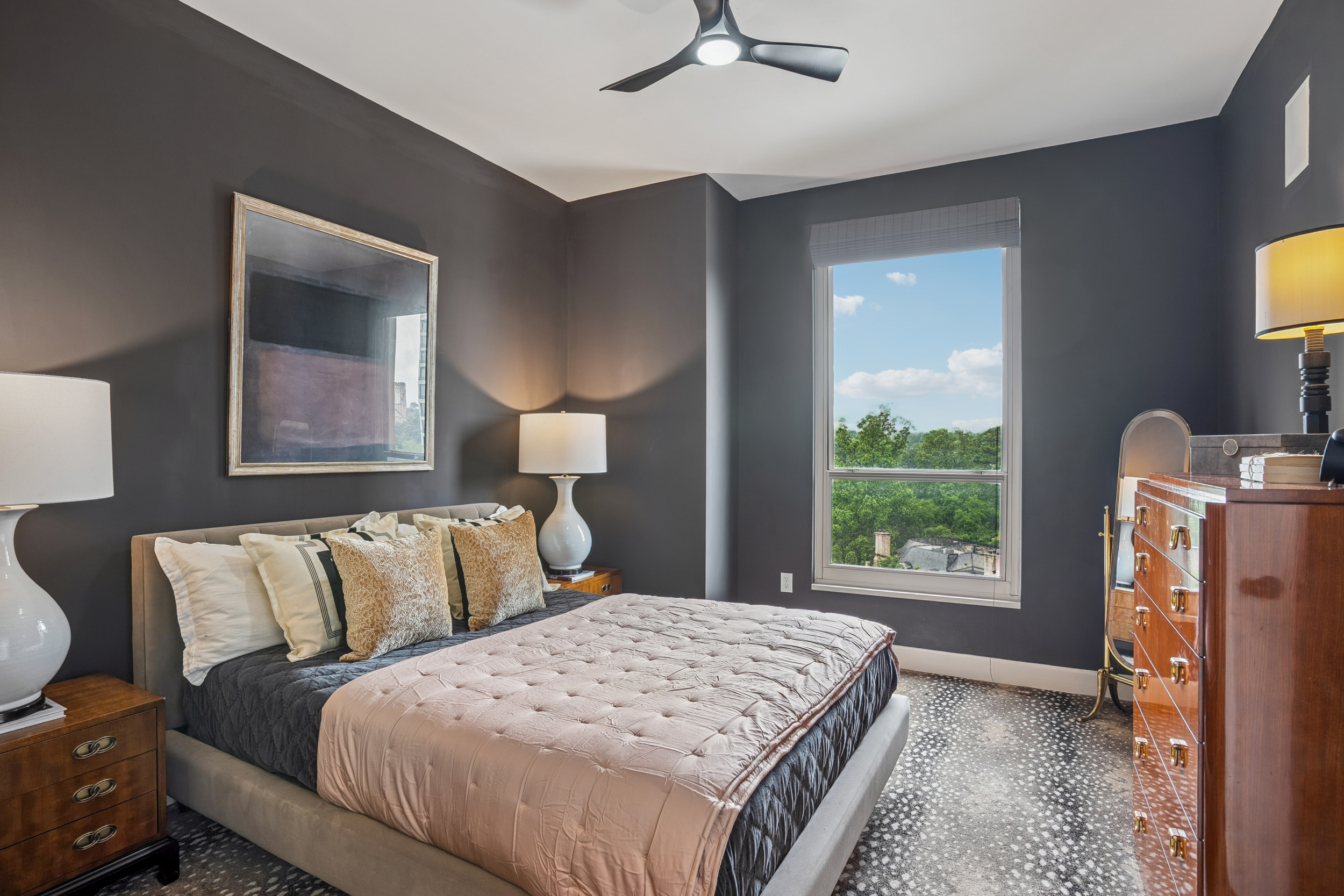 2626 Peachtree Road, Unit 1108 Atlanta, GA 30305 - Photo 10 of 25 a bedroom with a bed and a tv