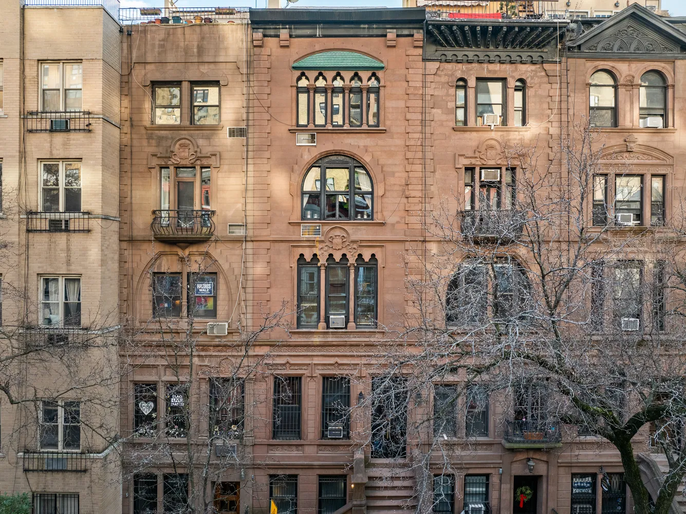 a front view of a building with a lot of windows