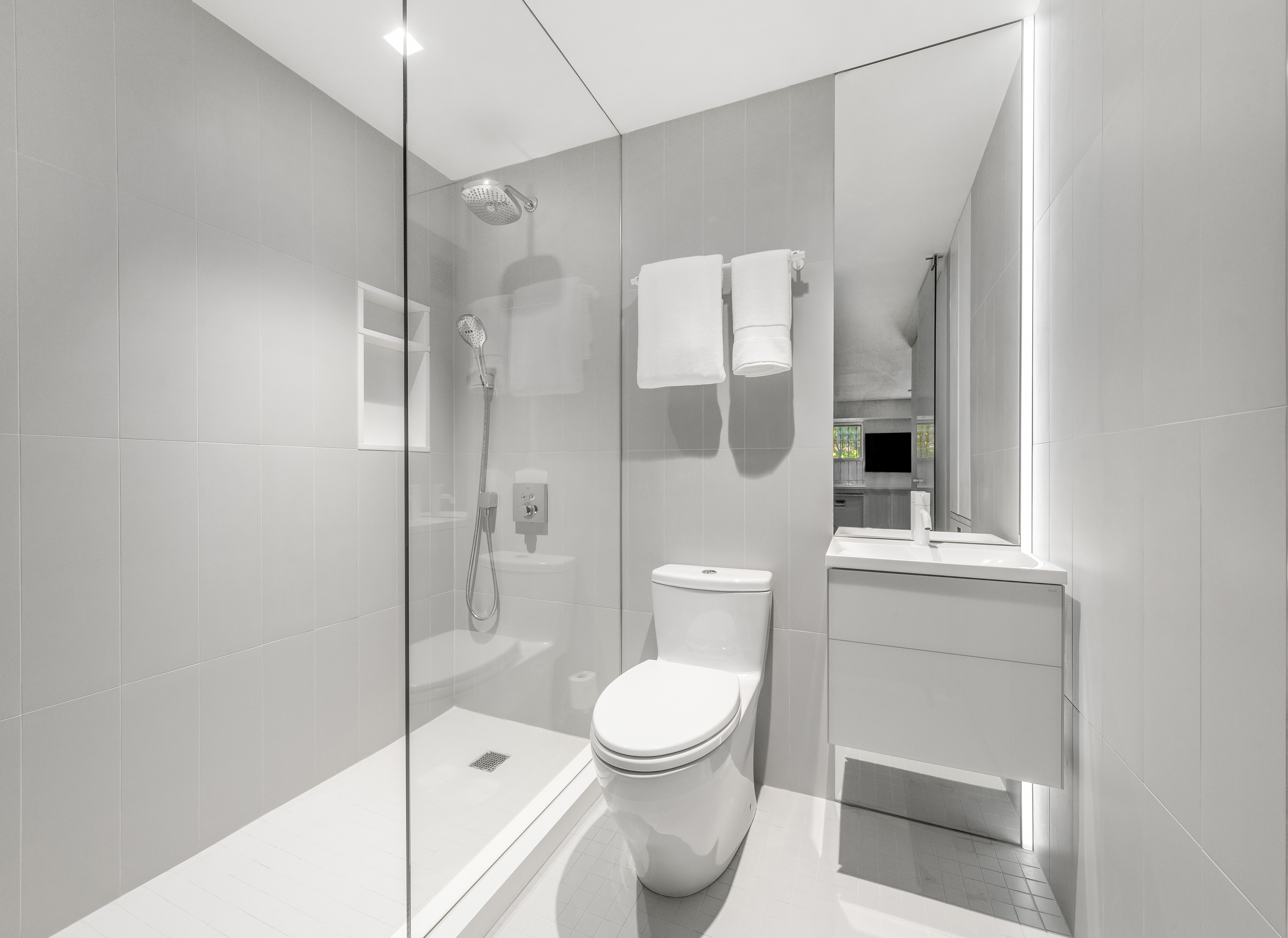 120 East 19th Street Manhattan, NY 10003 - Photo 20 of 33 a bathroom with a toilet and a shower