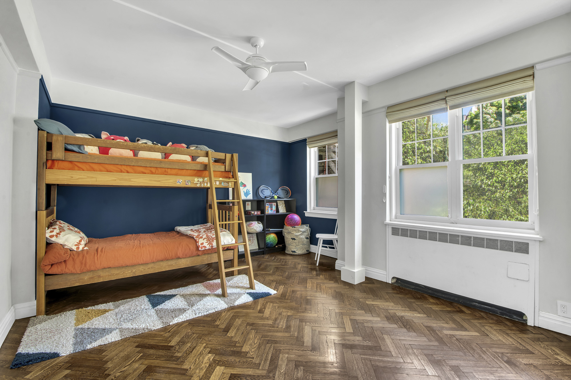 140 Cabrini Boulevard, Unit 14 Manhattan, NY 10033 - Photo 7 of 30 a bedroom with furniture and window