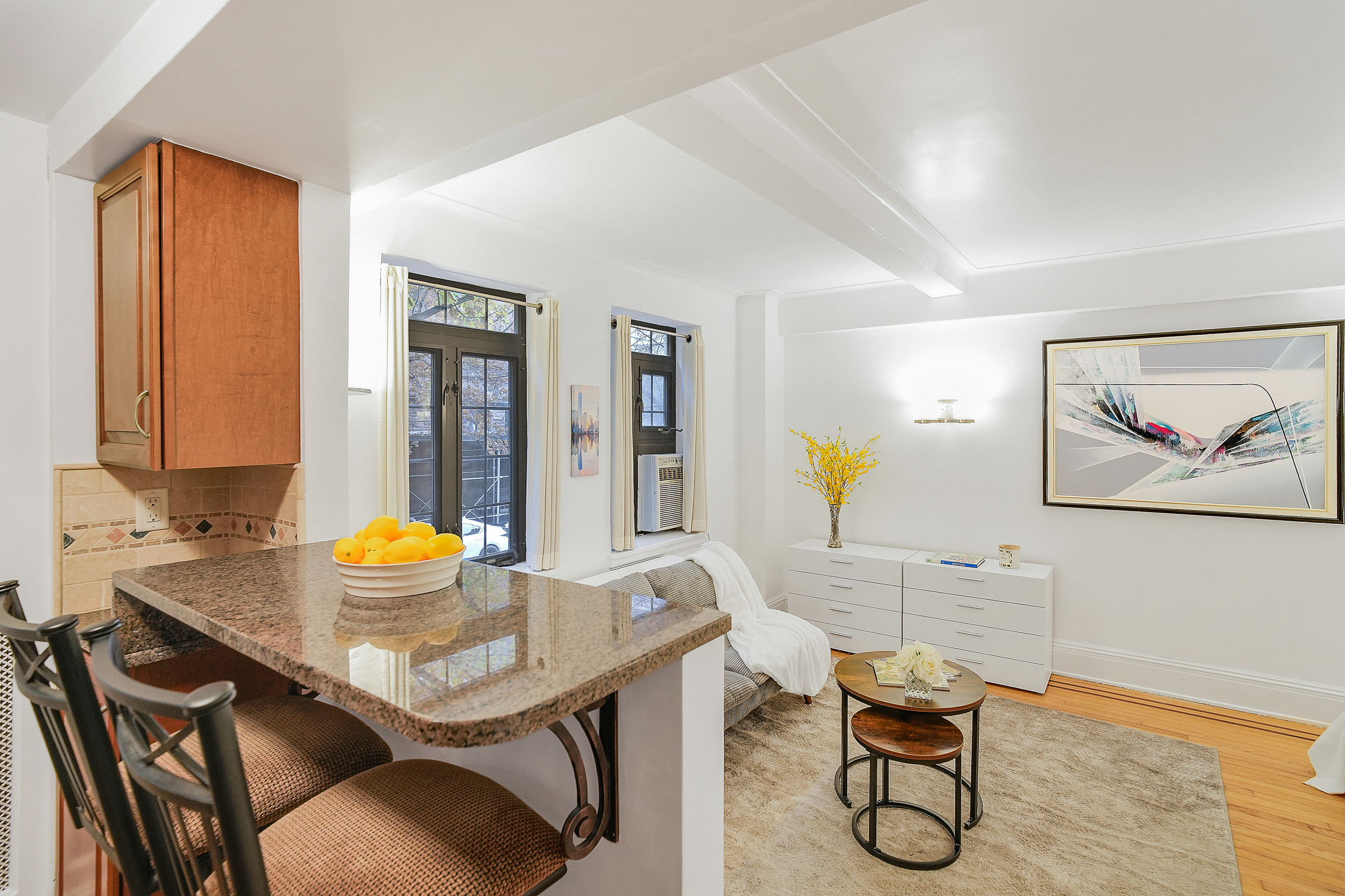 102 West 85th Street, Unit 2B Manhattan, NY 10024 - Photo 7 of 16 a view of a dining room with furniture and wooden floor