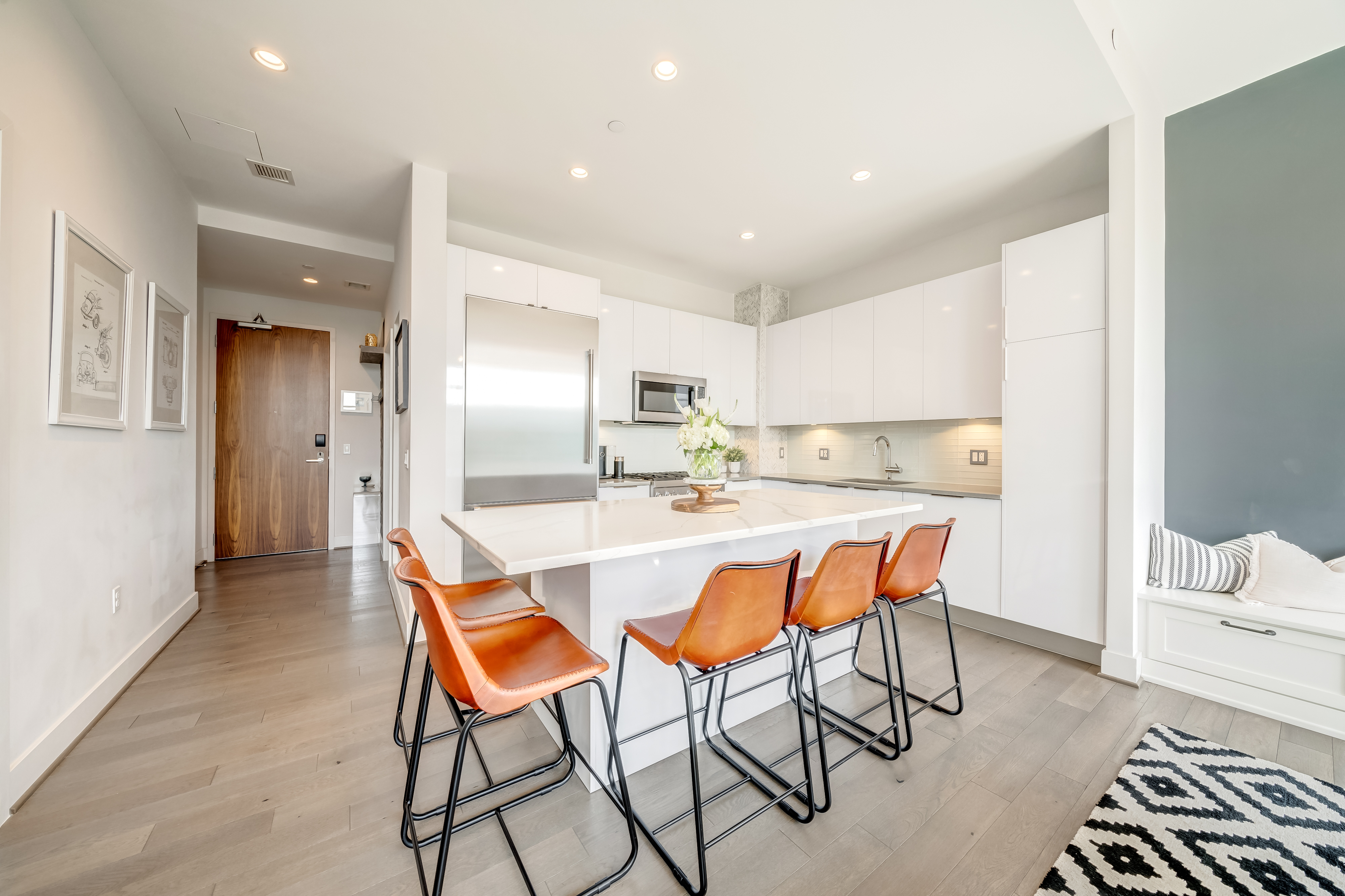 45 Sutton Square Southwest, Unit PH10 Washington, DC 20024 - Photo 14 of 44 a dining room with a table and chairs