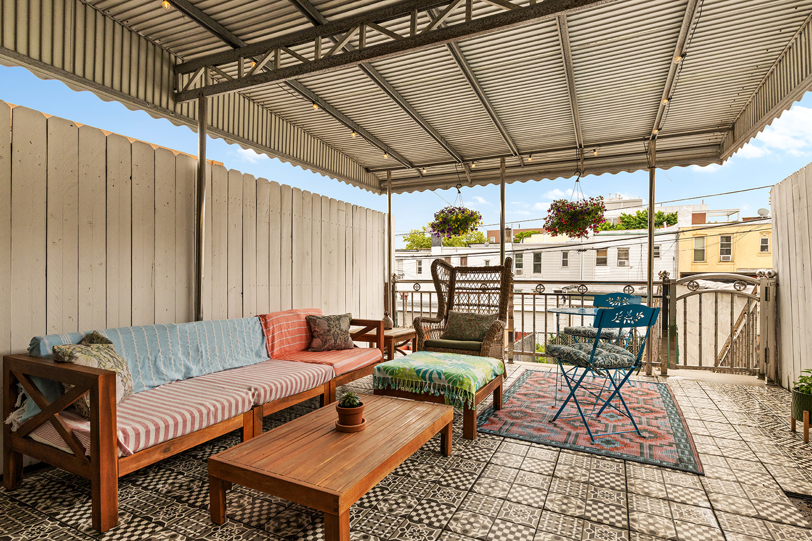 570 19th Street Brooklyn, NY 11218 - Photo 5 of 13 a living room with patio furniture and a wooden floor