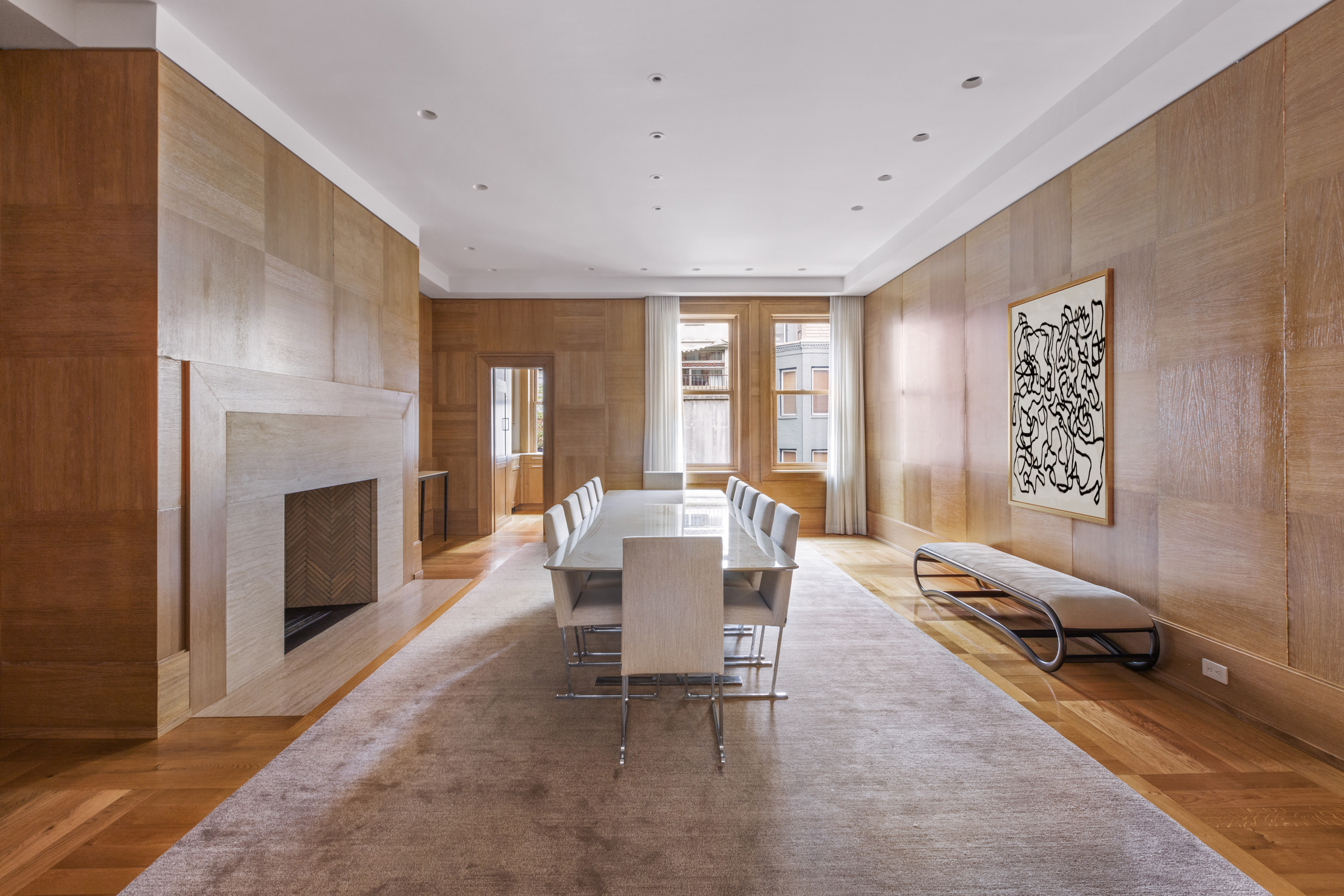 45 East 74th Street Manhattan, NY 10021 - Photo 11 of 33 a living room with furniture a window and a fireplace